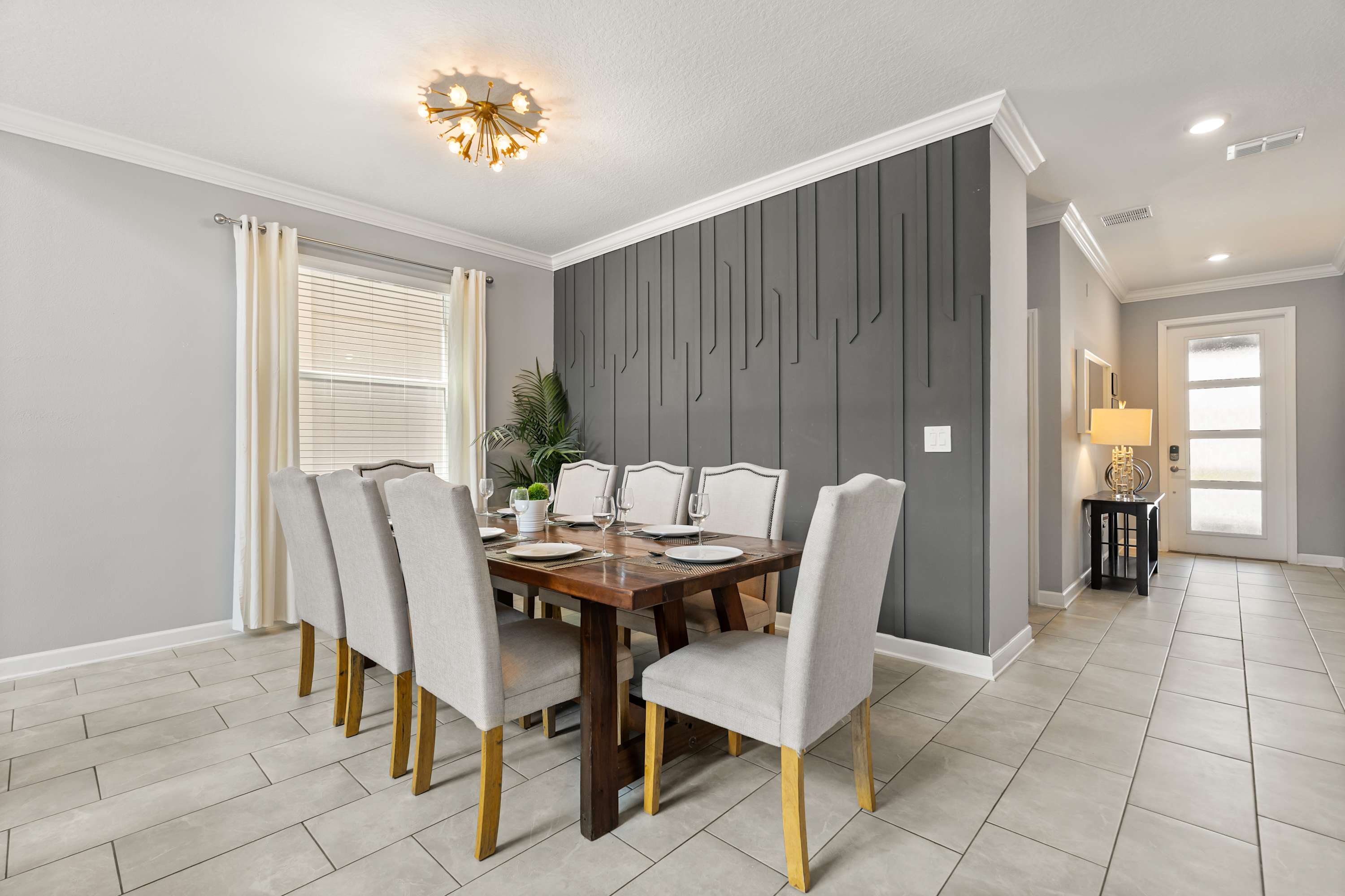 Stylish dining area with seating for the whole group to share meals together.