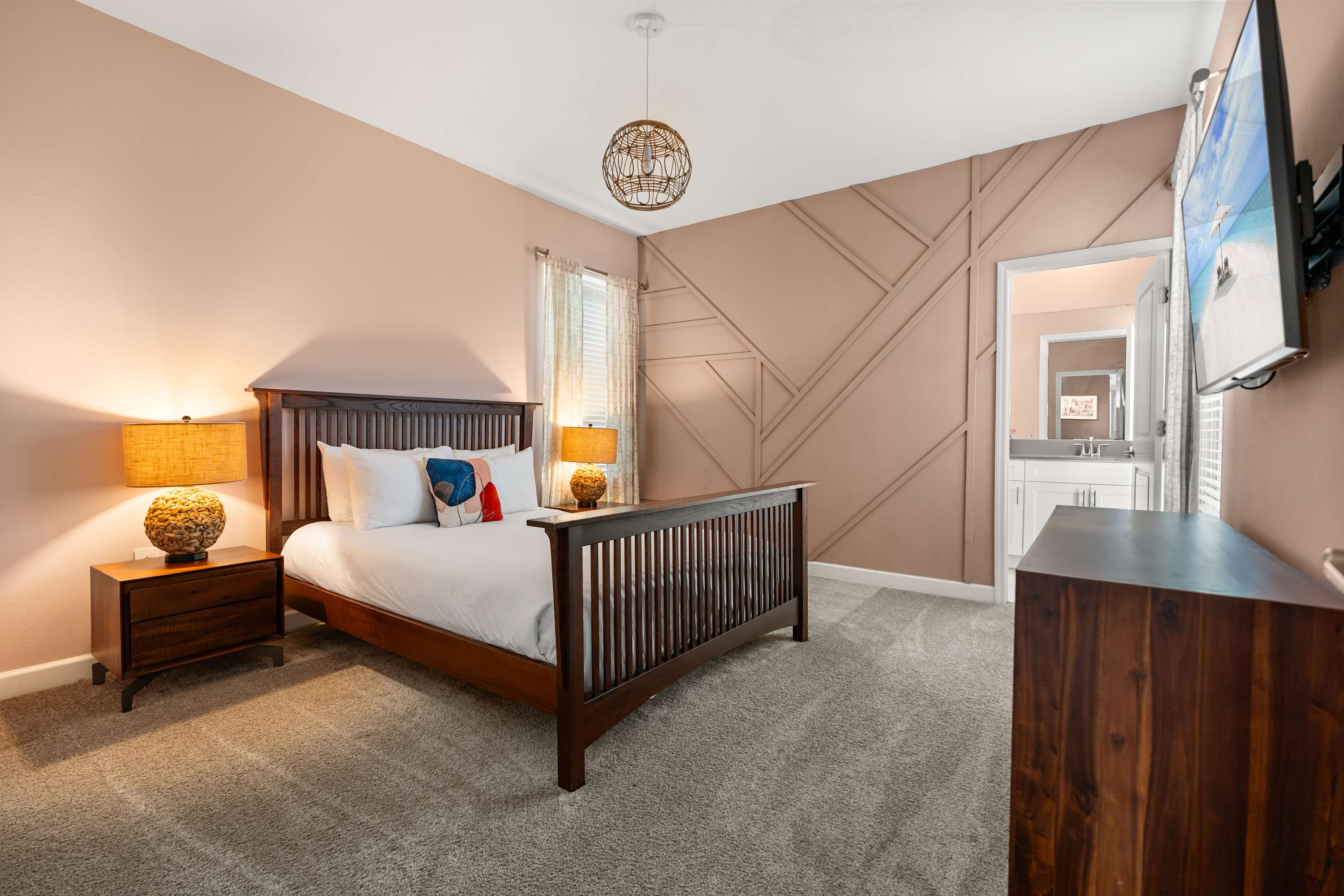 Relax in this cosy bedroom featuring a comfortable double bed, perfect for unwinding after a day of fun.