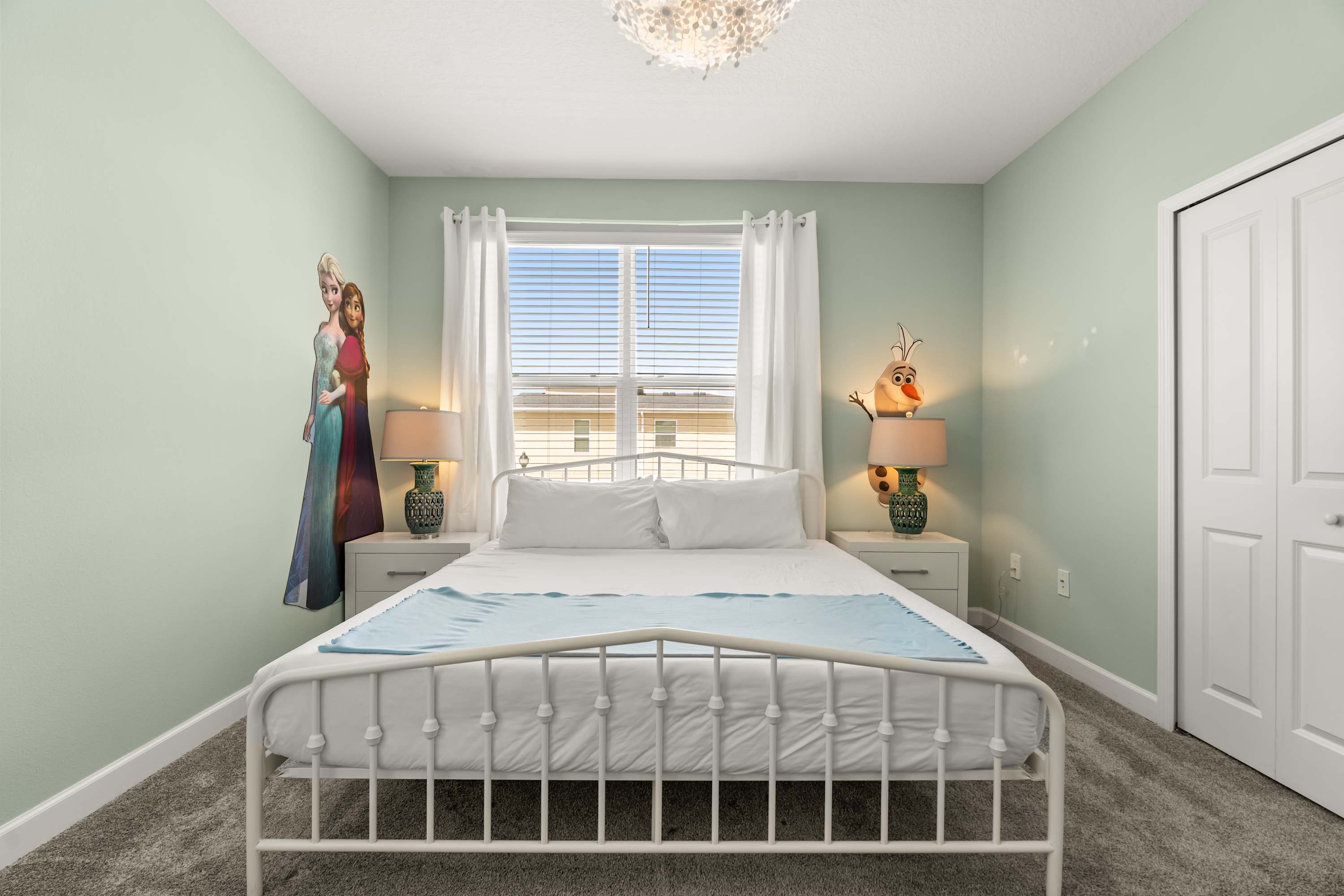 Enjoy hotel-style luxury in this peaceful king bedroom, ideal for restful nights.