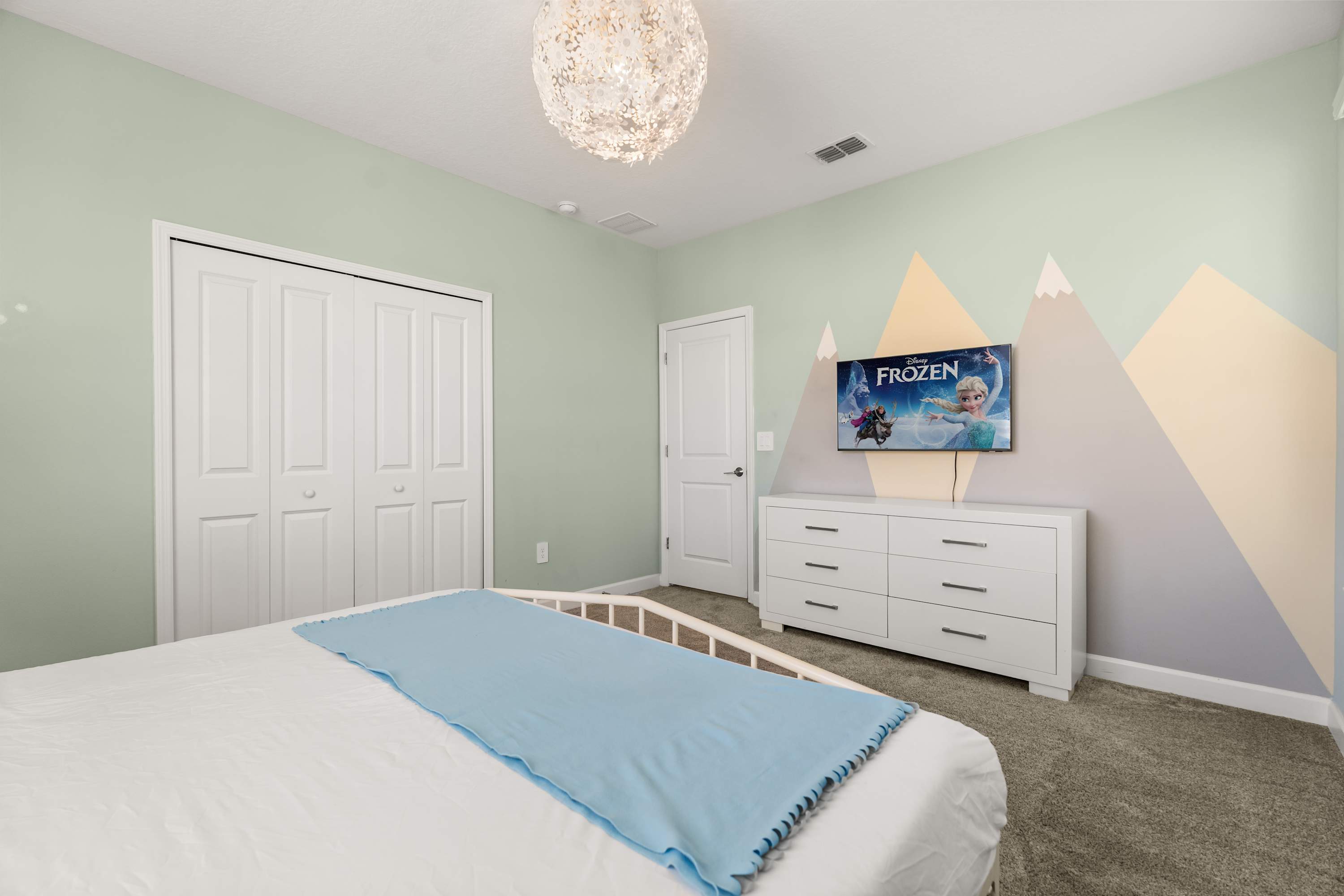 Enjoy hotel-style luxury in this peaceful king bedroom, ideal for restful nights.