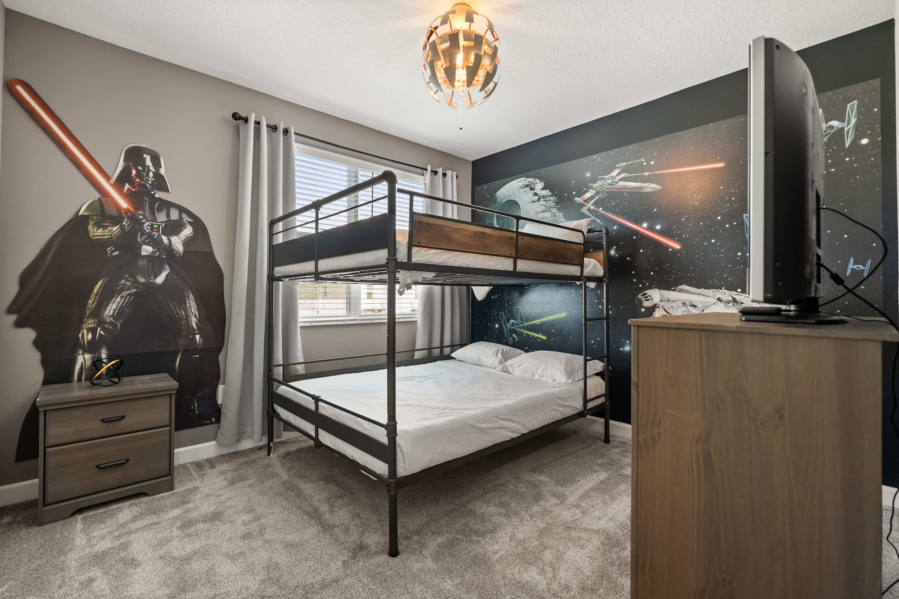The kids will love this fun Star Wars bunk bedroom with plenty of space to play and relax.