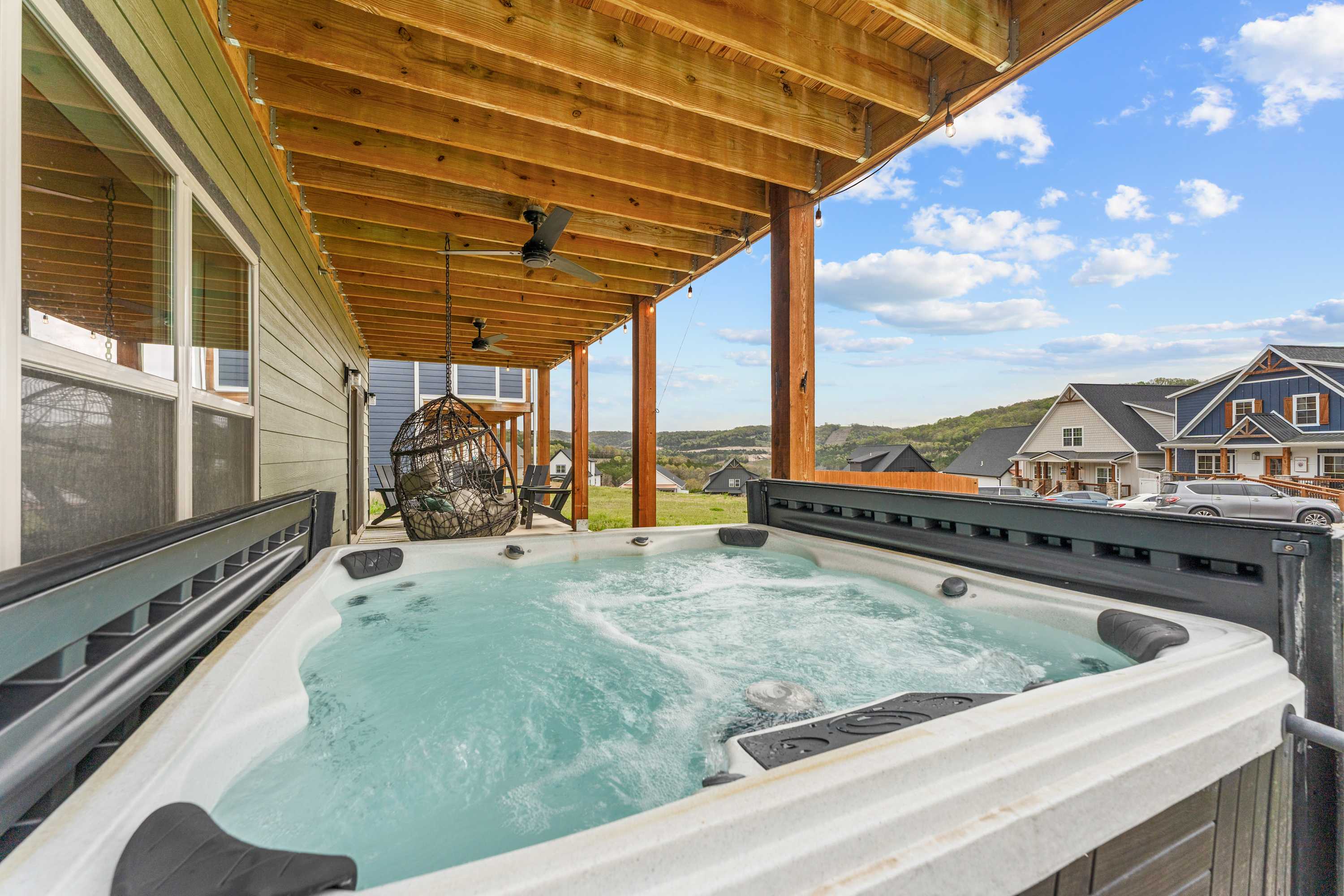 Bask in bubbling bliss in the private hot tub​