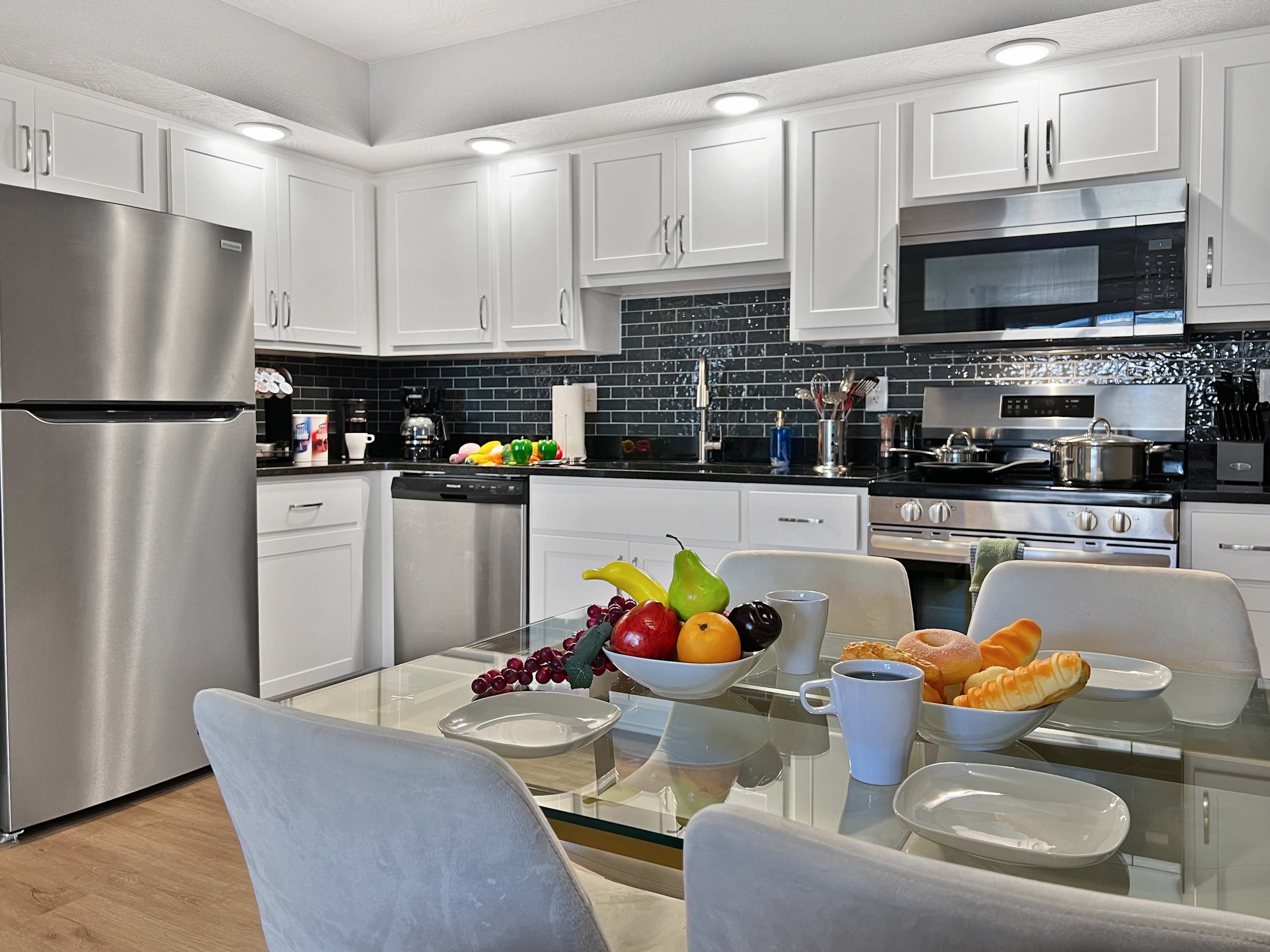 Full size completely stocked kitchen. Everything you need to cook meals, heat up leftovers or grab a wine glass to enjoy as you unwind.