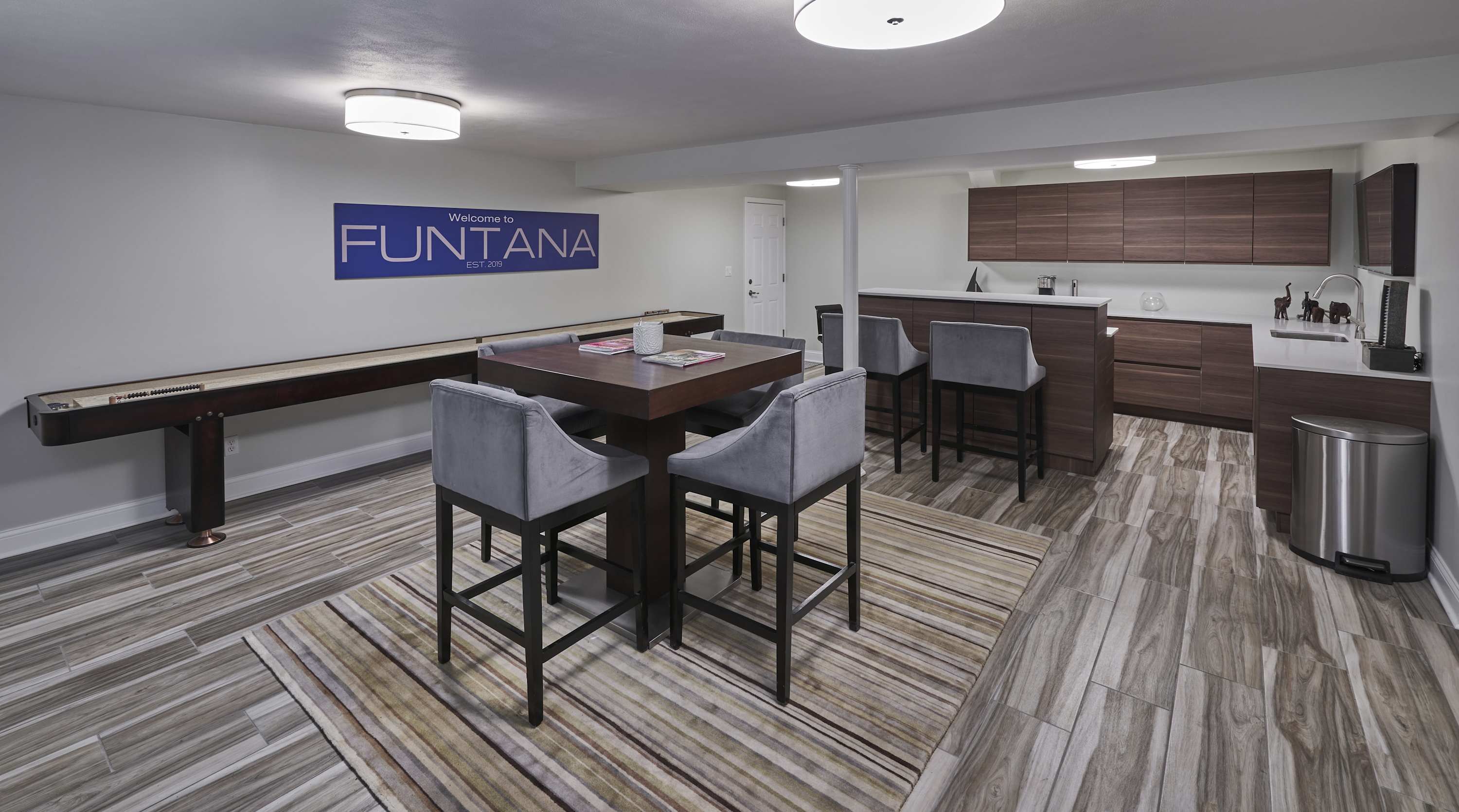 The lower level is ideal for movie nights, game tournaments, and more!​