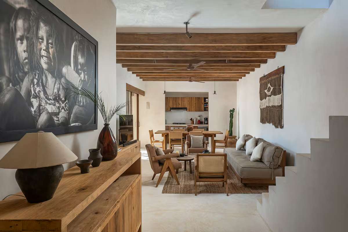 Ground floor with open space. Includes kitchen, dining room, living room, and private patio.