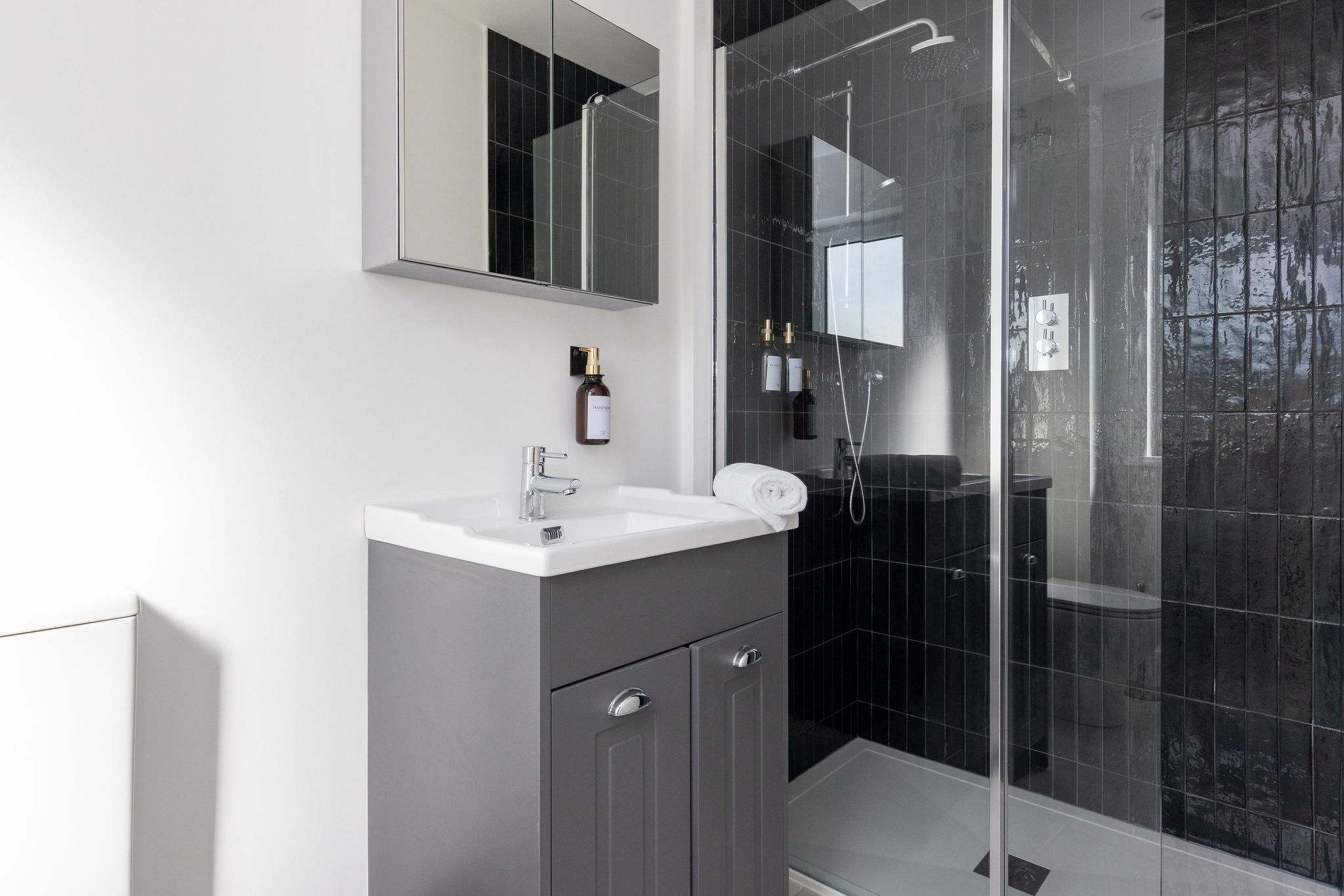 Refresh and unwind in the spacious, modern walk-in rainfall shower.