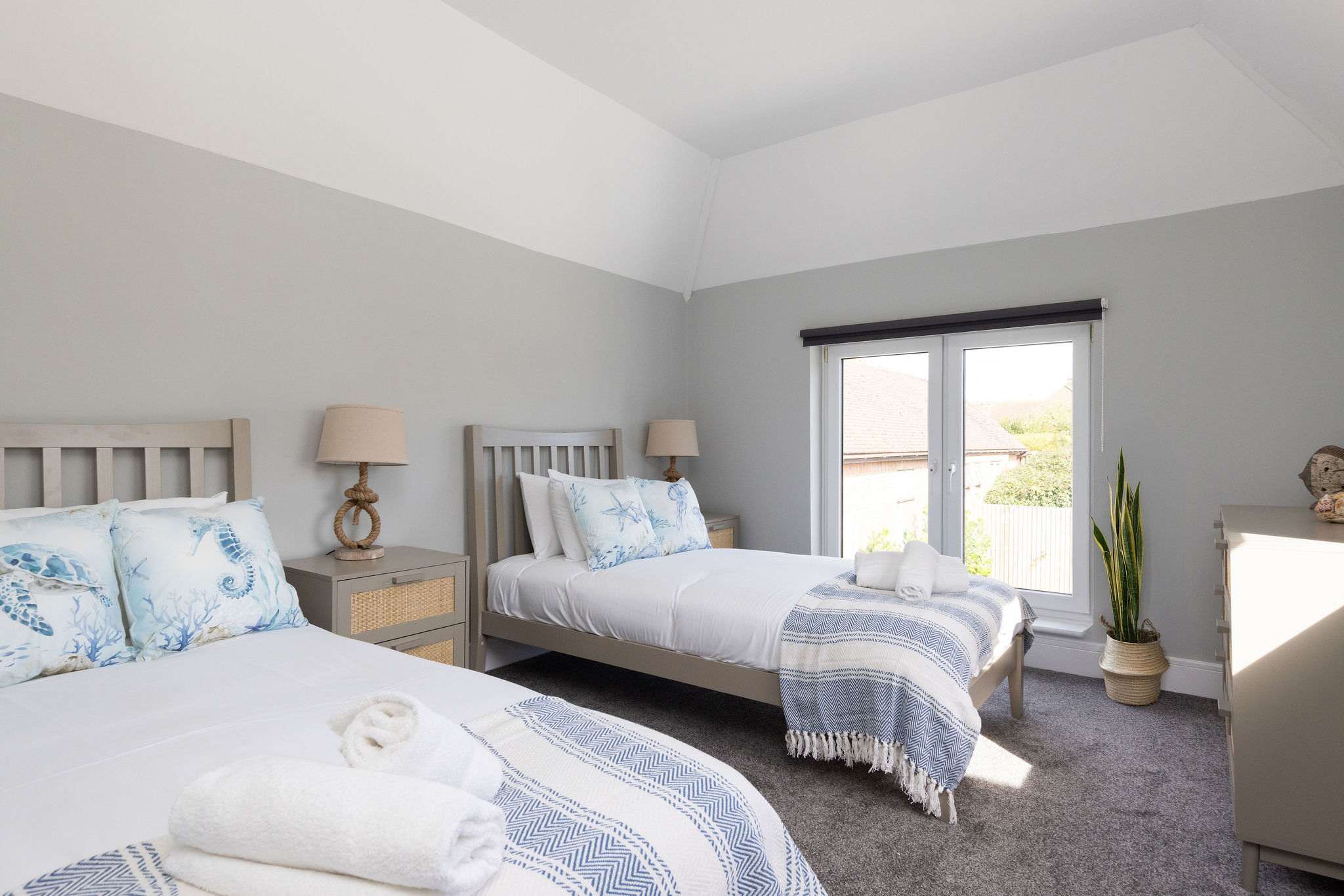 Bright and airy twin room, flooded with natural light.