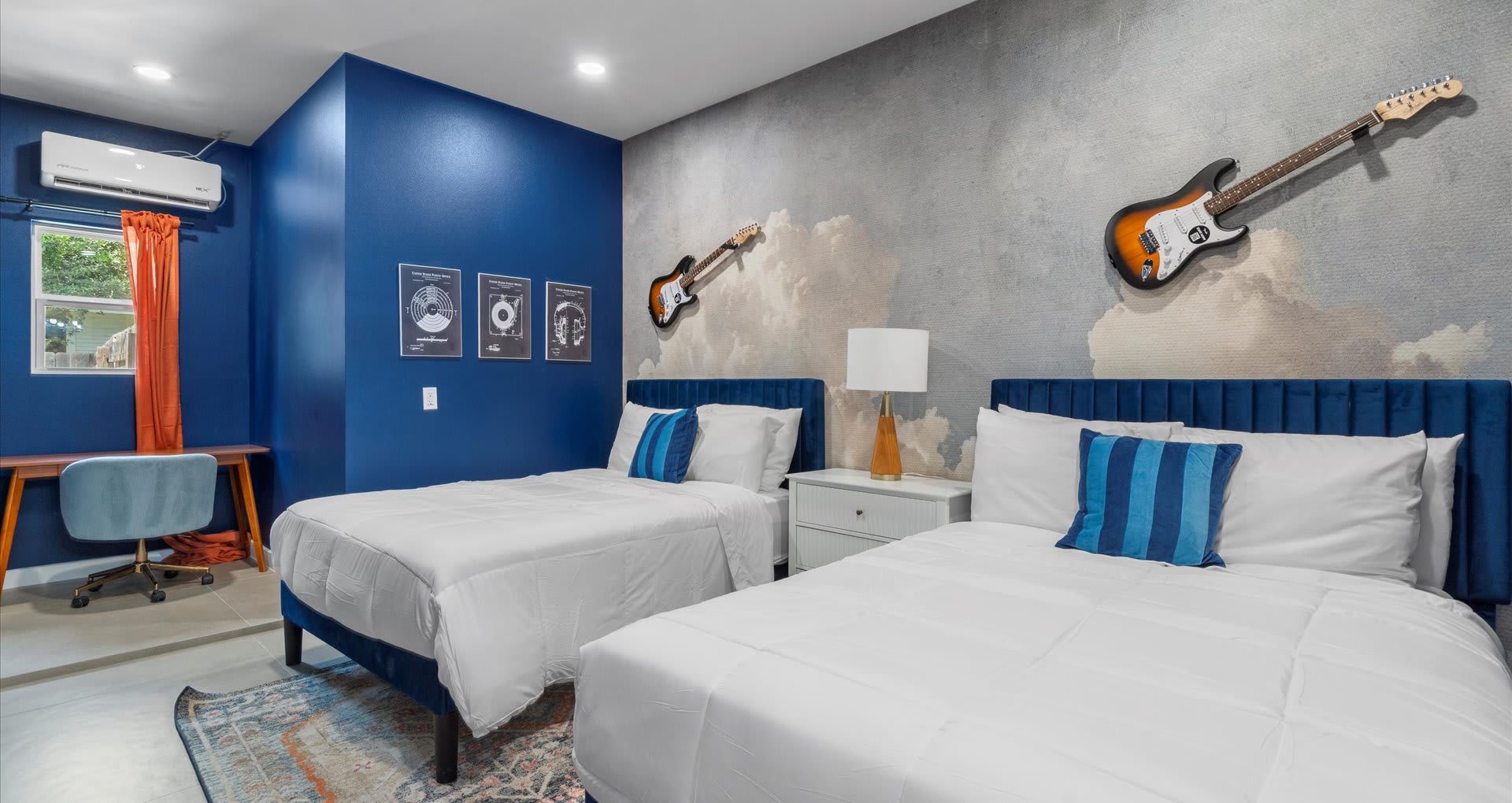 Spacious twin bedroom with two cozy double beds, perfect for friends or family traveling together.