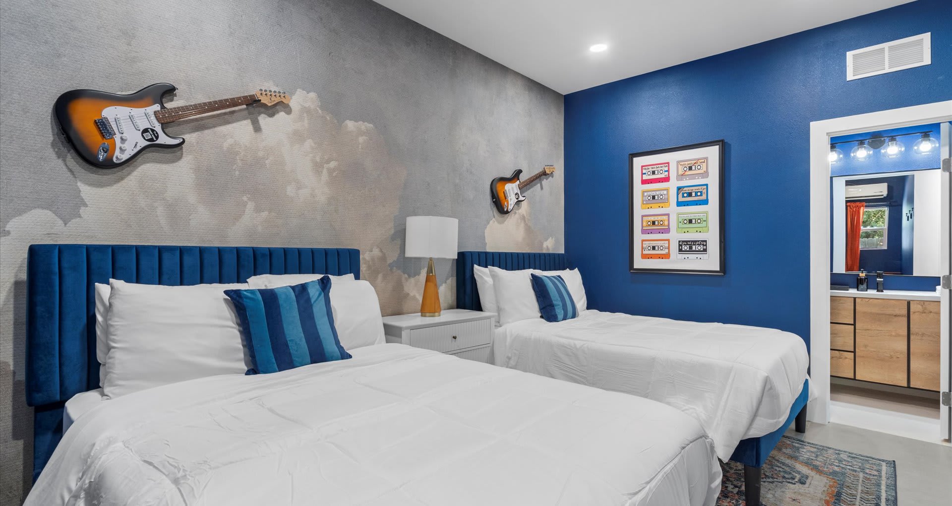 Spacious twin bedroom with two cozy double beds, perfect for friends or family traveling together.