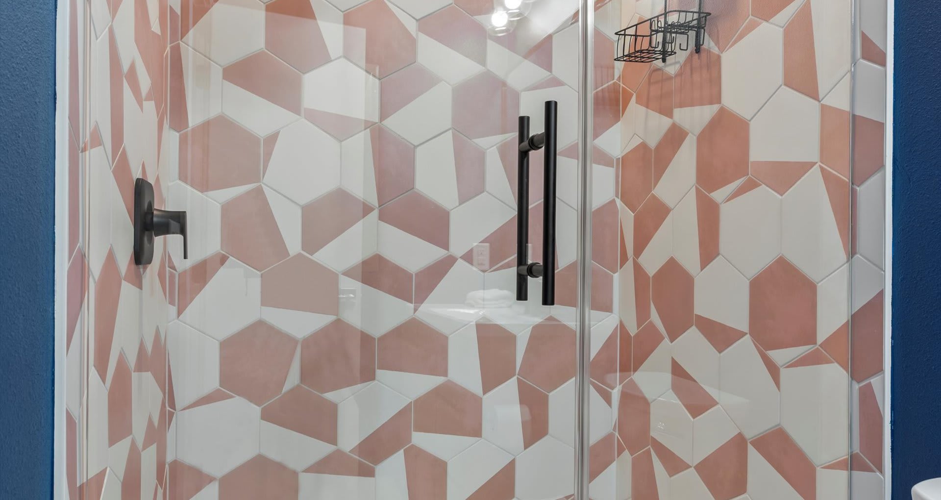 Modern en-suite bathroom with stunning vanity and glass standing shower