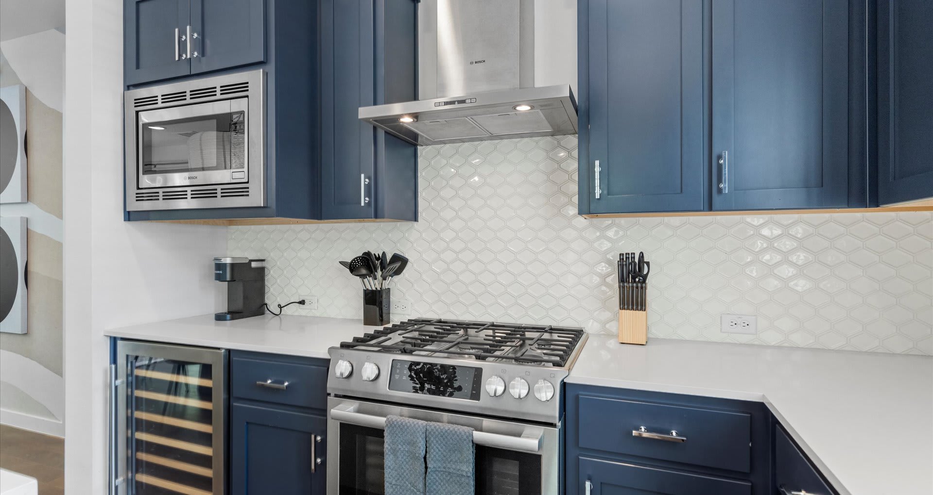 Fully equipped kitchen, featuring sleek appliances, ample counter space, and everything you need for home-cooked meals.