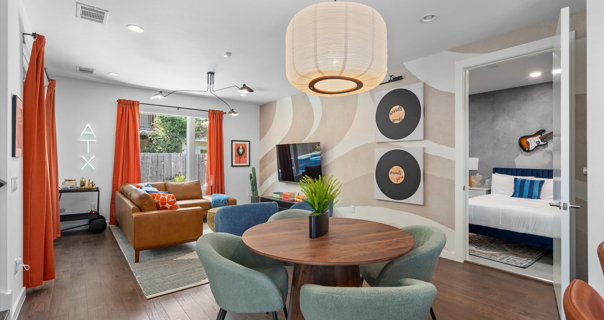 Open-concept living and dining area with contemporary furnishings