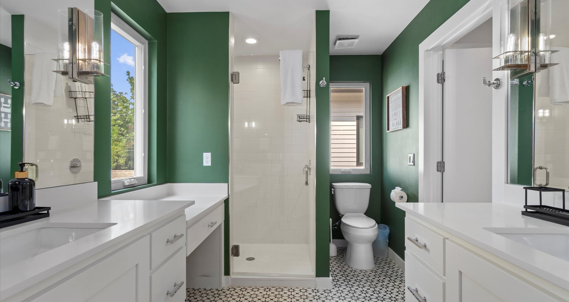 Gorgeous en-suite bathroom with earth tones featuring a modern standing shower
