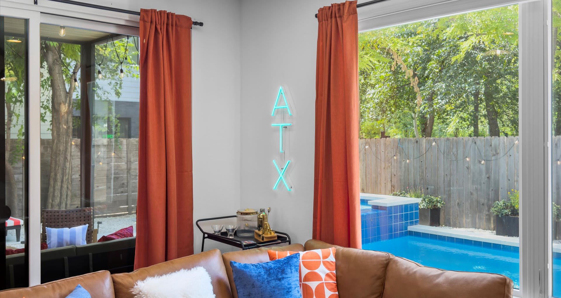 Bright living room with comfortable sofa and eclectic décor