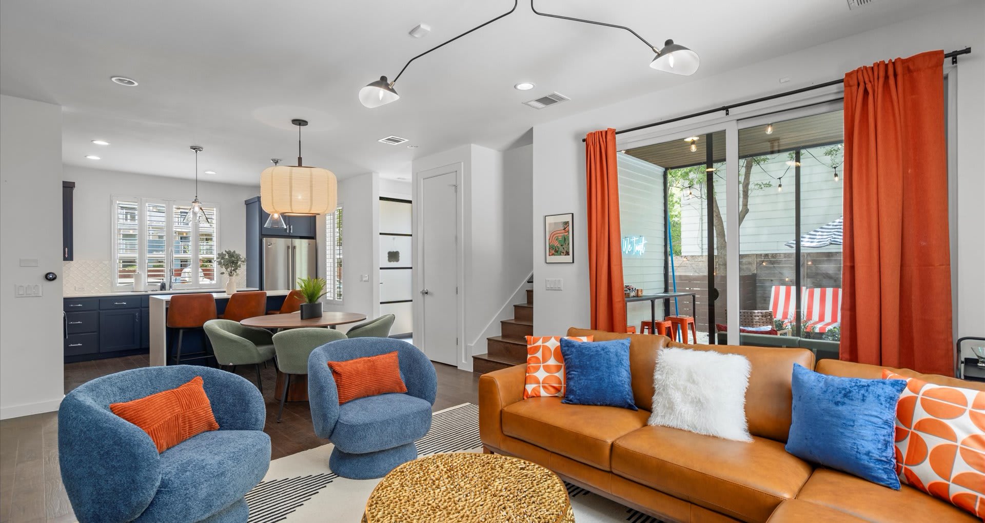 Bright living room with comfortable sofa and eclectic décor