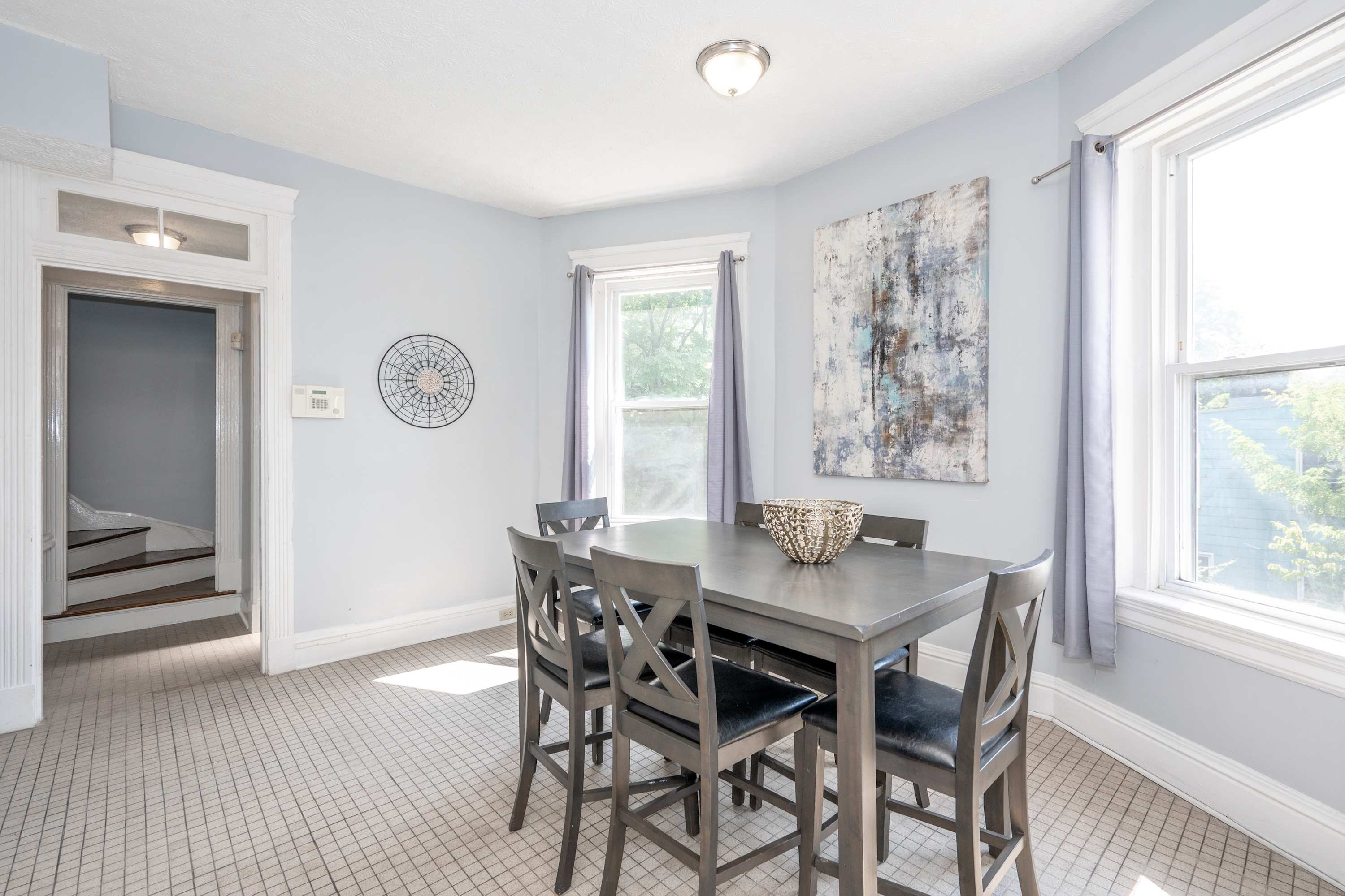 Gather for meals together at the elegant dining table, seating 6​