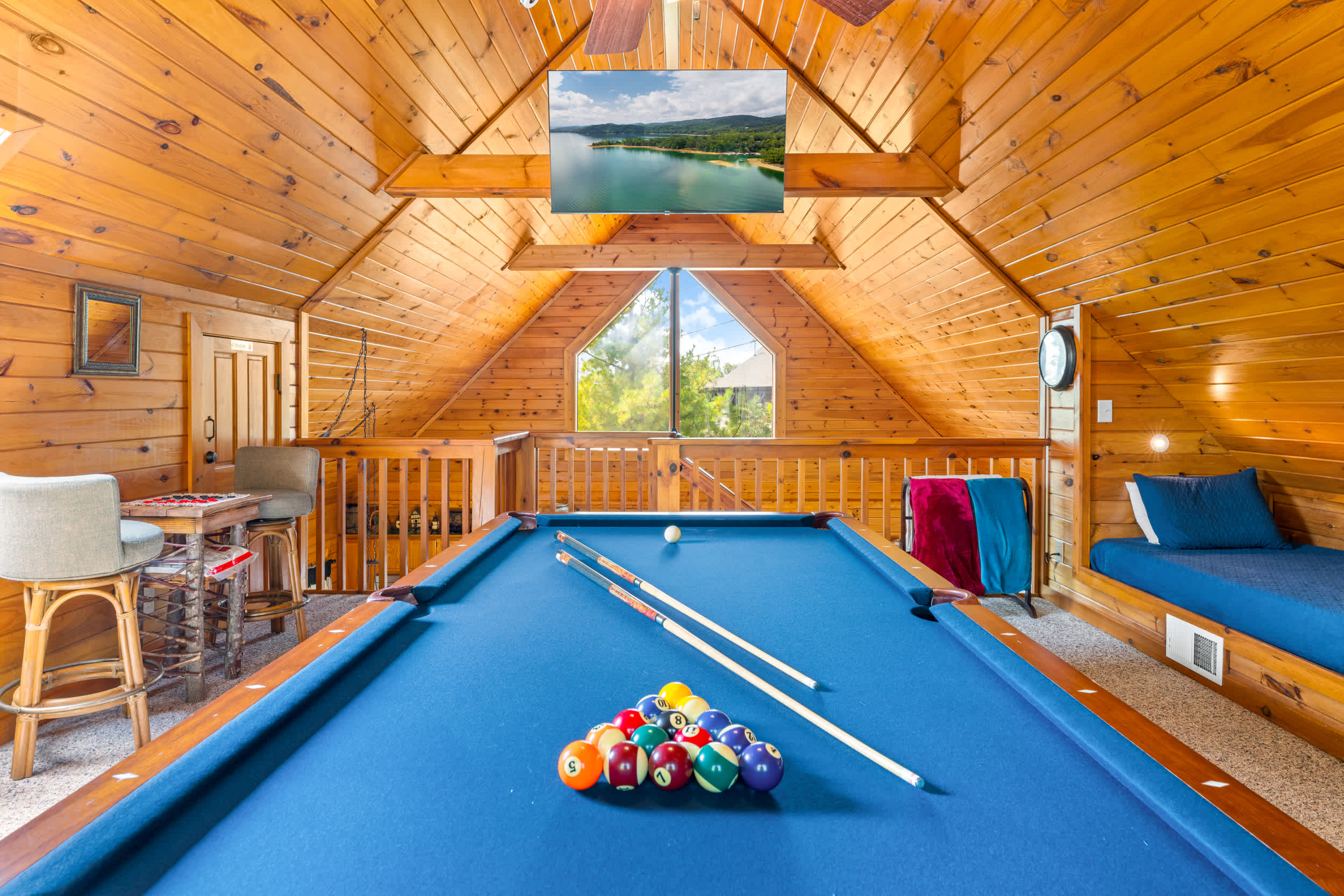 Challenge your friends or family to a game in the cozy loft with a full-size pool table