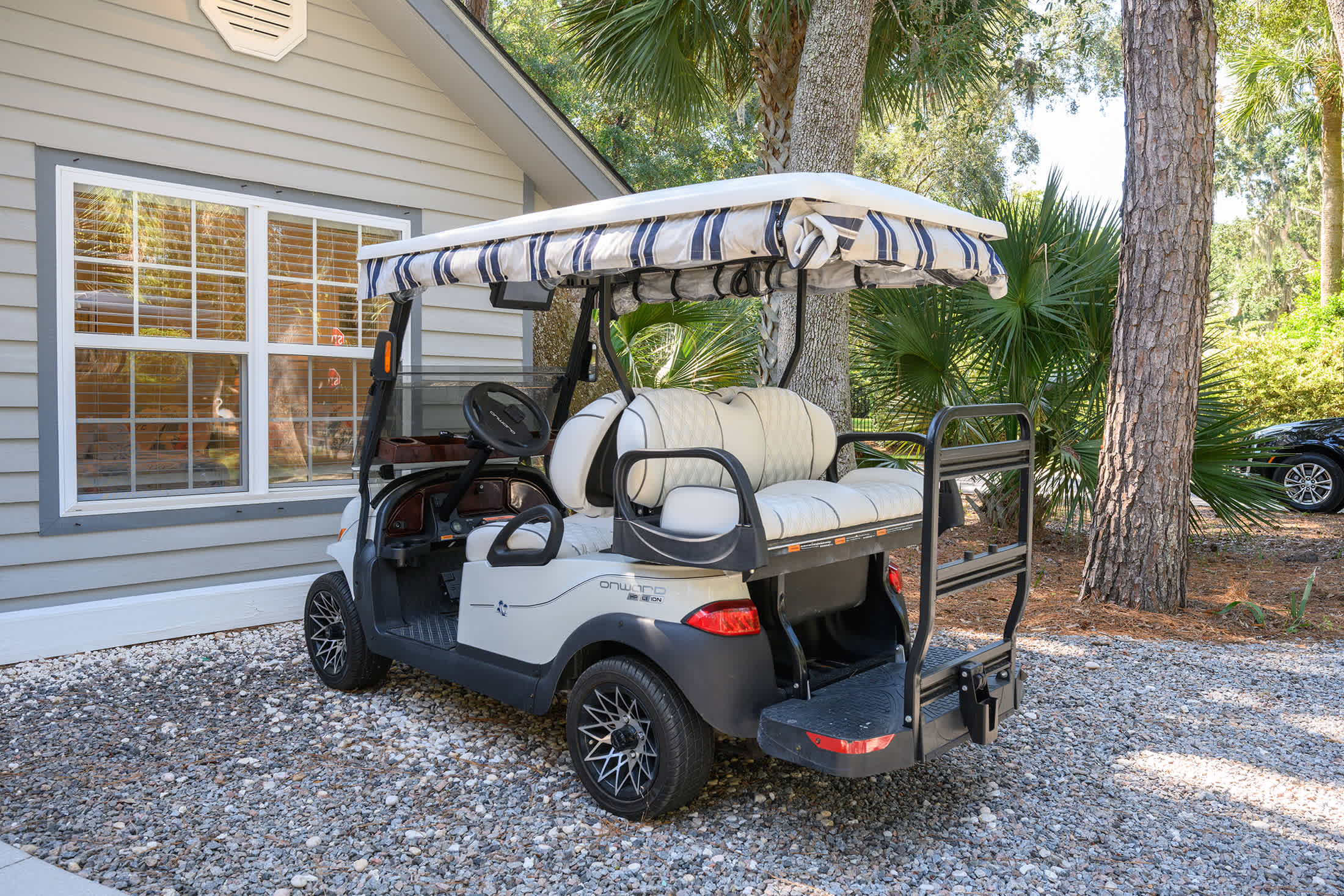 Zip around in the included golf cart!