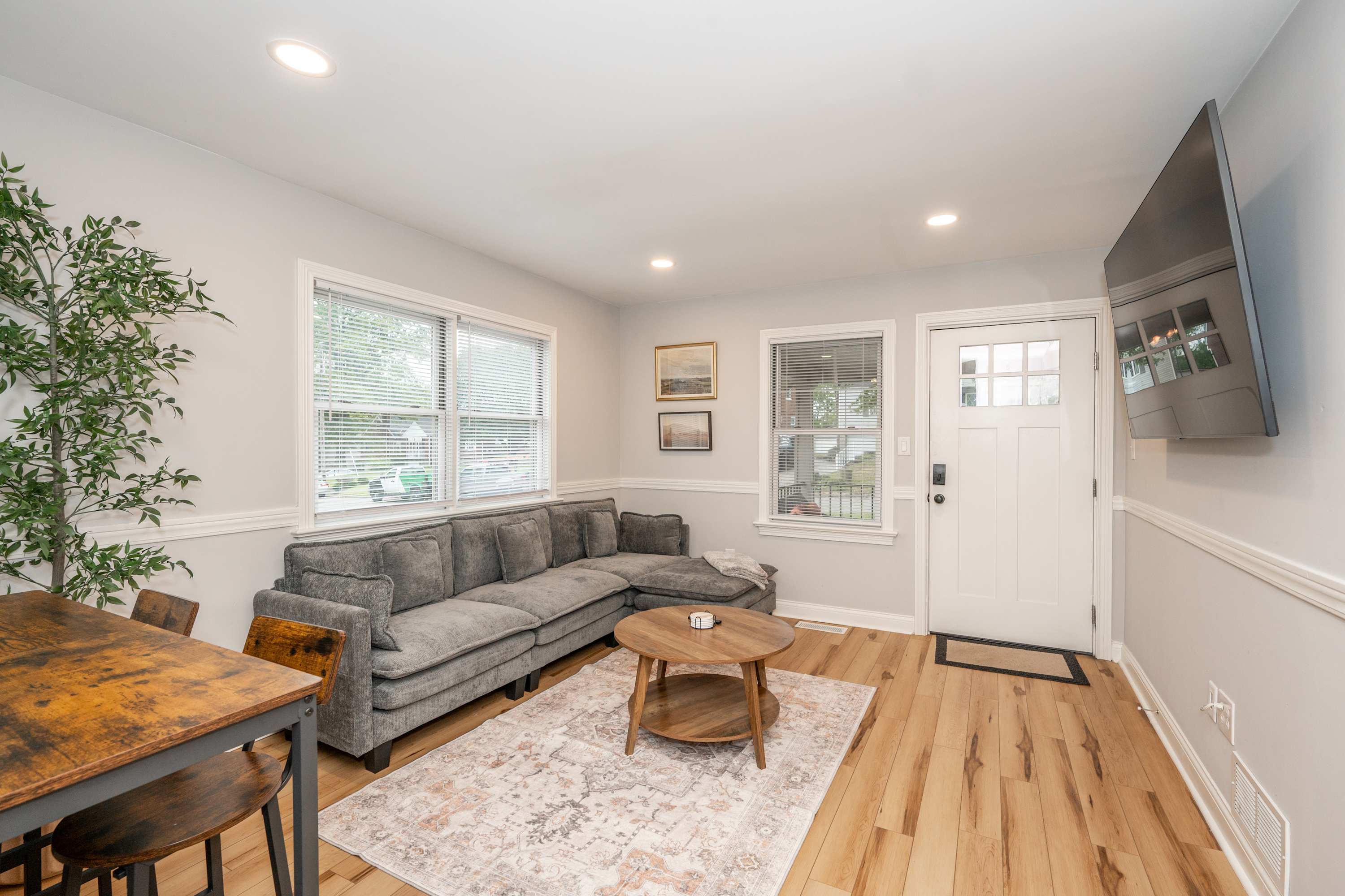 Curl up in the airy living room & stream your favorites on the smart TV​