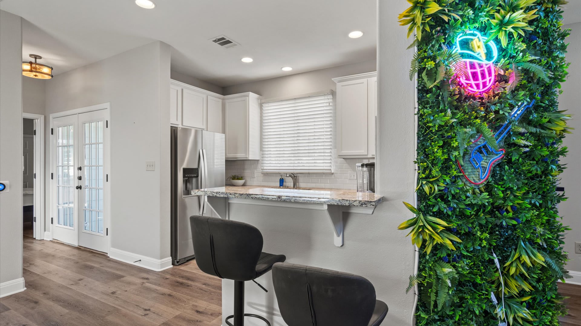 Newly renovated kitchen area and art wall