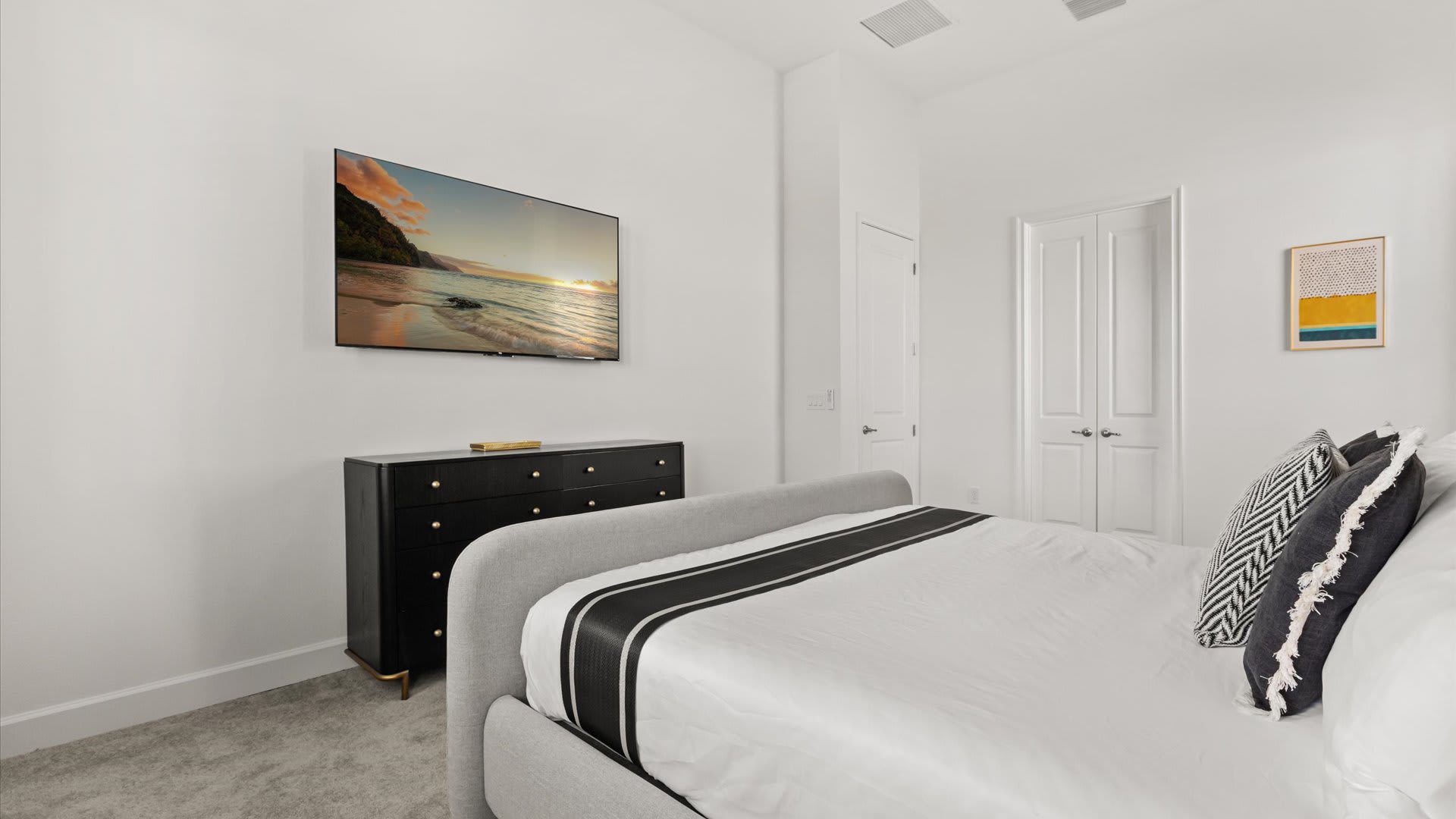 King Bedroom with smart TV and en-suite bathroom