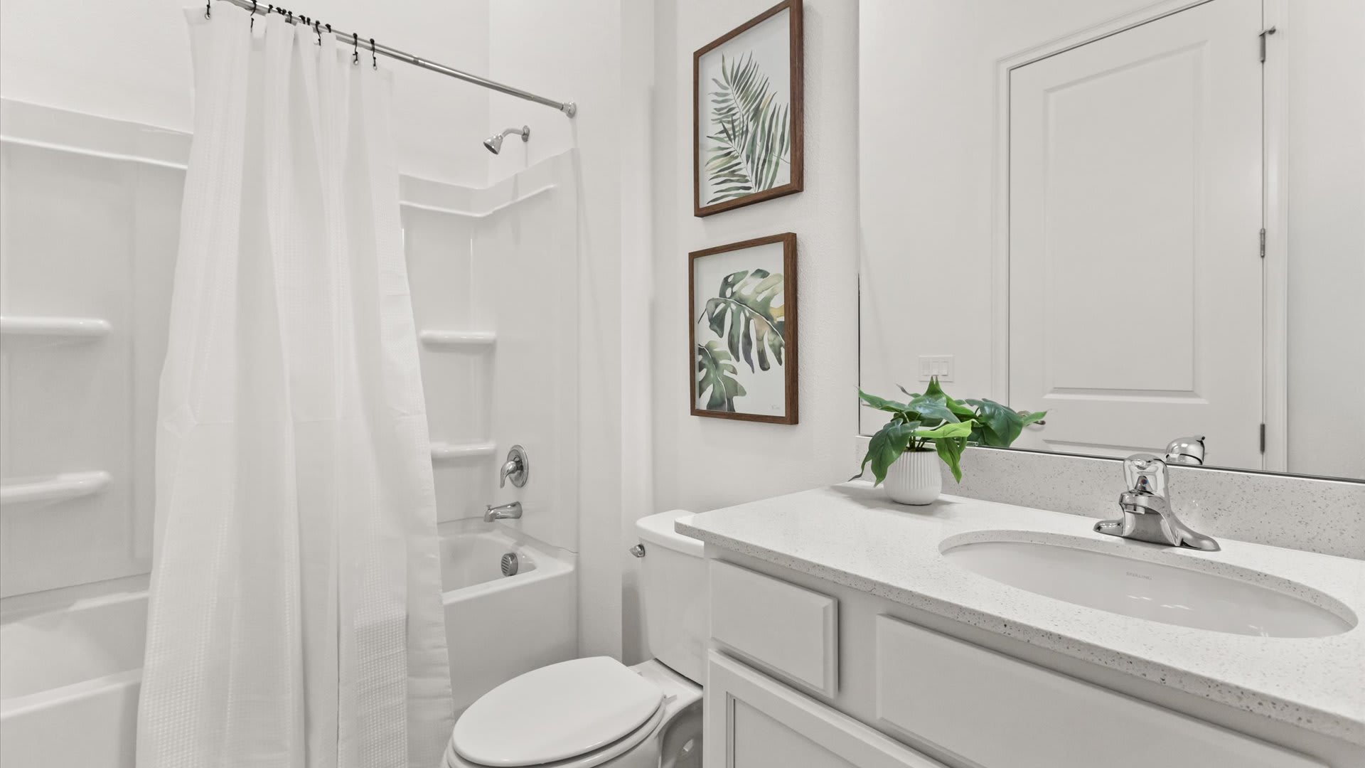 Full bathroom with combined bathtub and shower