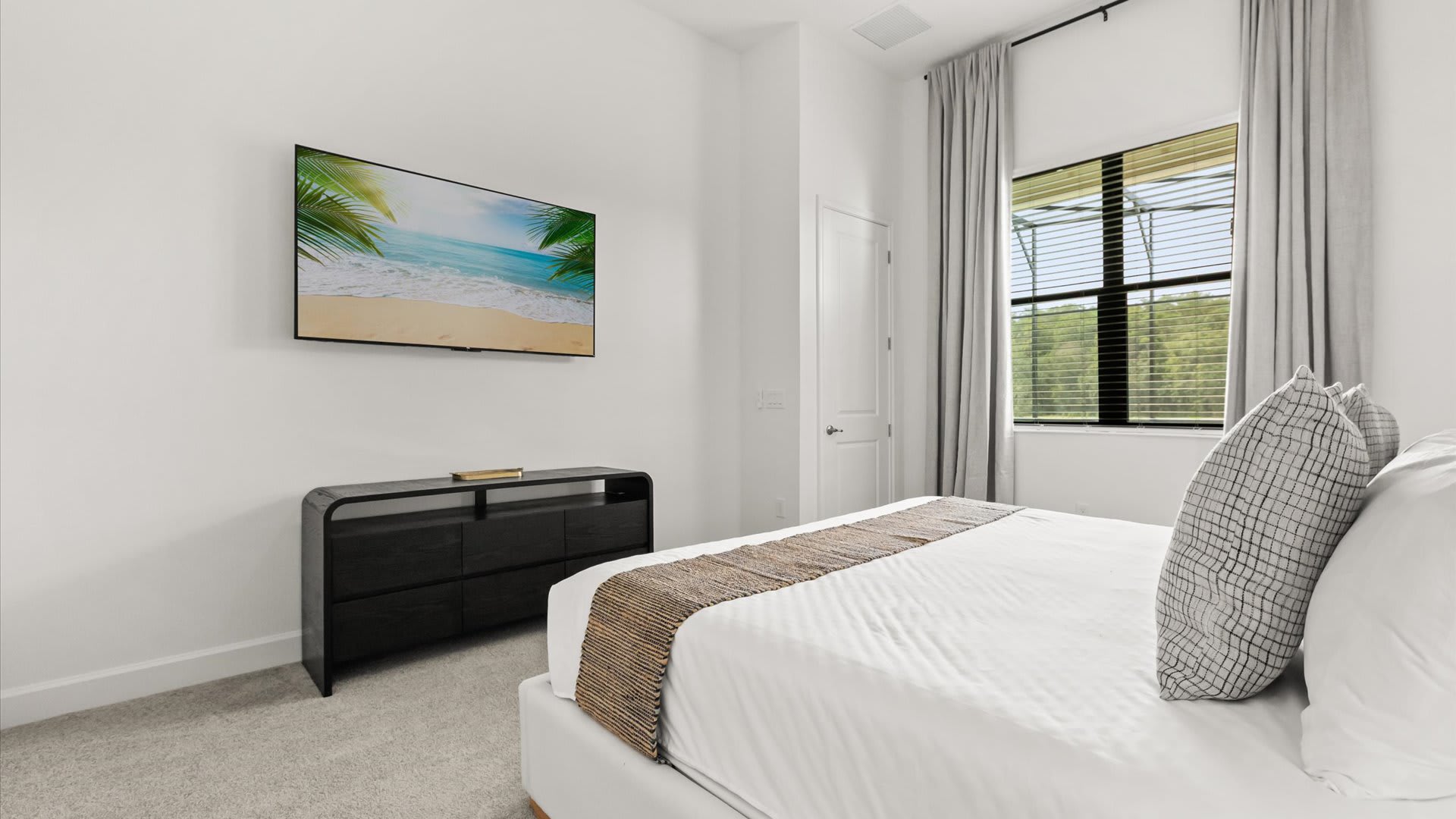Peaceful King Bedroom with smart TV