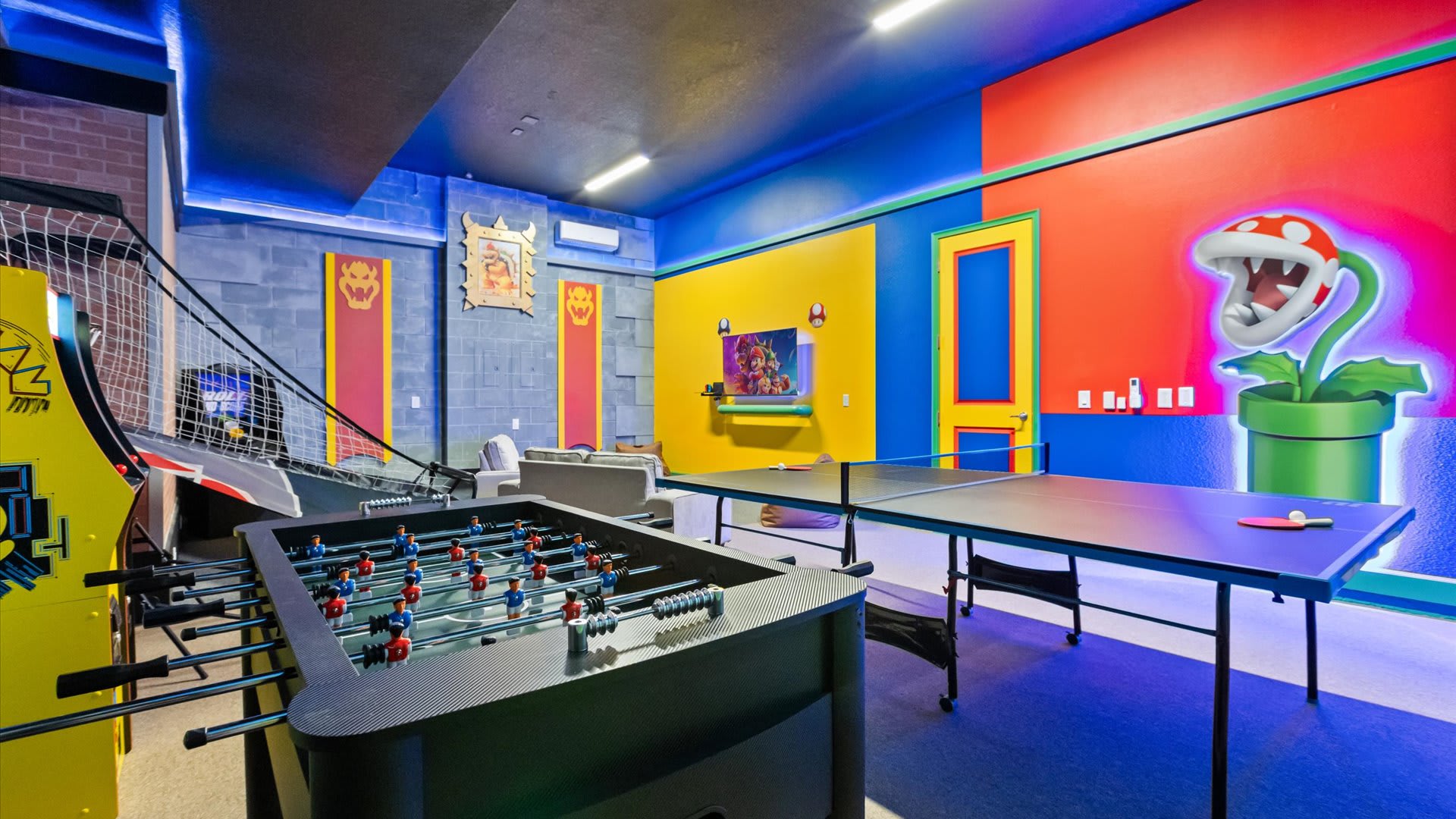 Games room with table tennis, foosball and arcade games