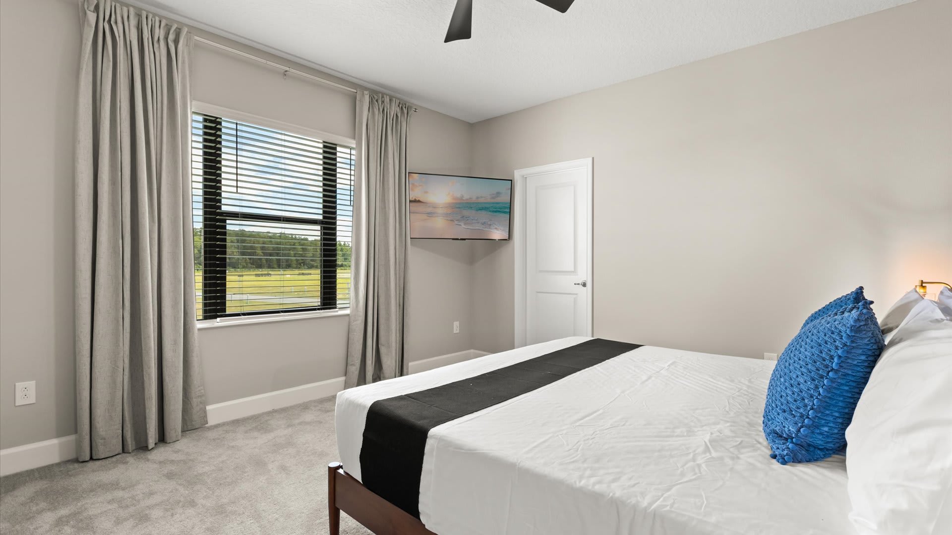 Elegant King Bedroom with smart TV