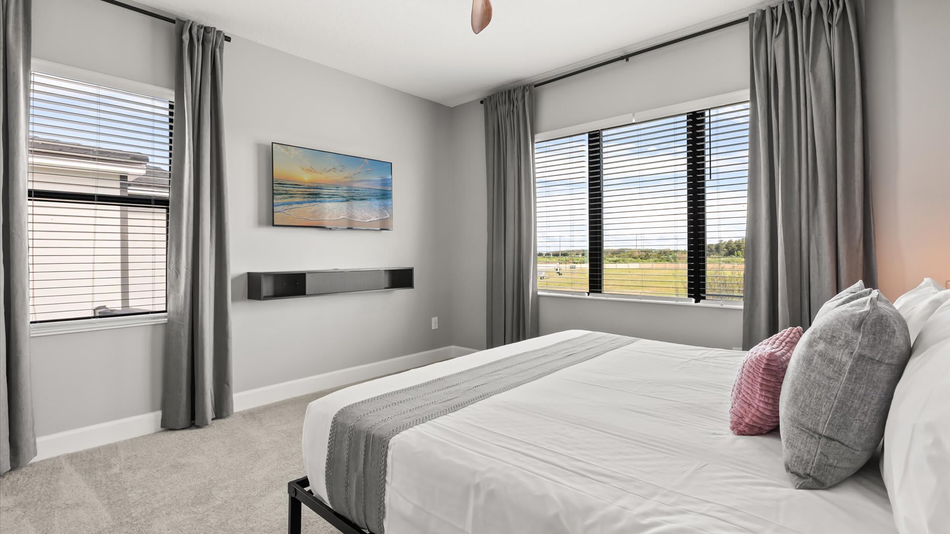 Queen bedroom with smart TV