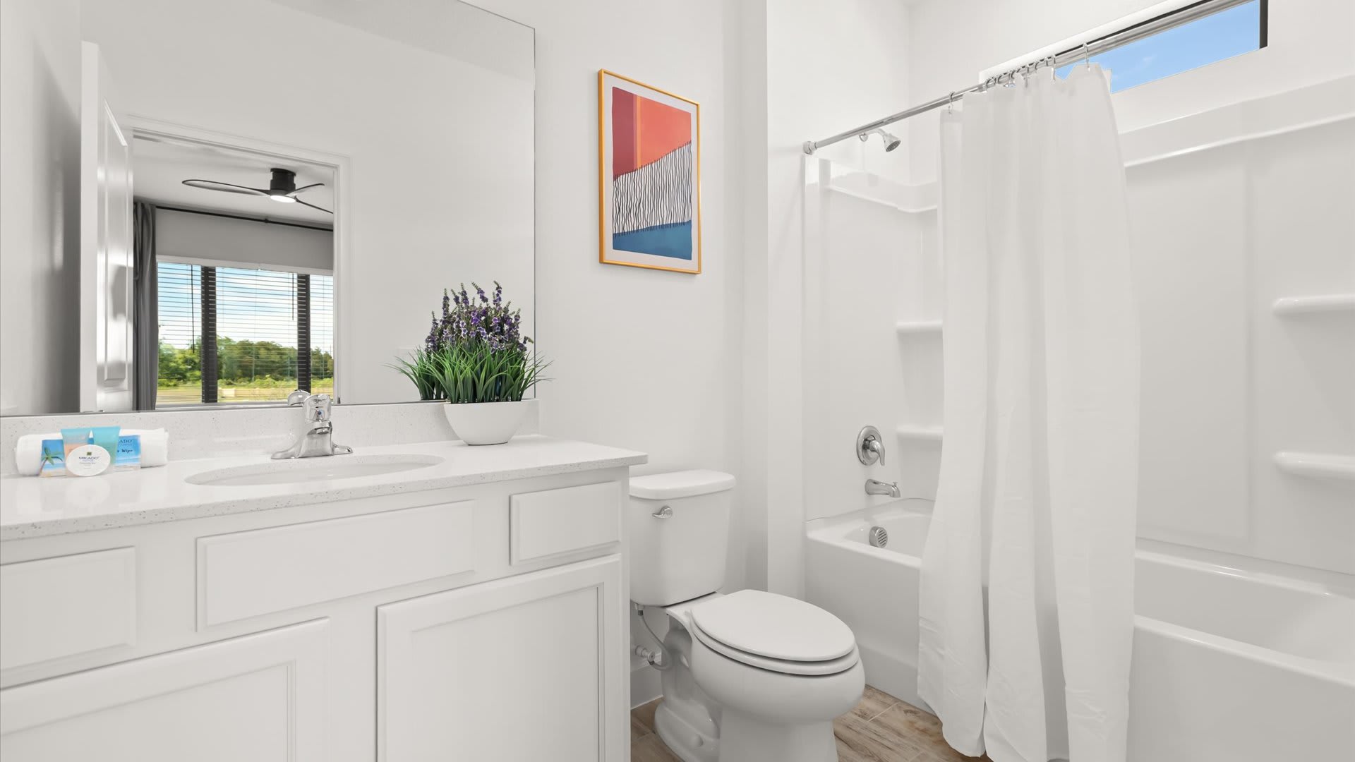 Gorgeous en-suite bathroom with combined bathtub and shower