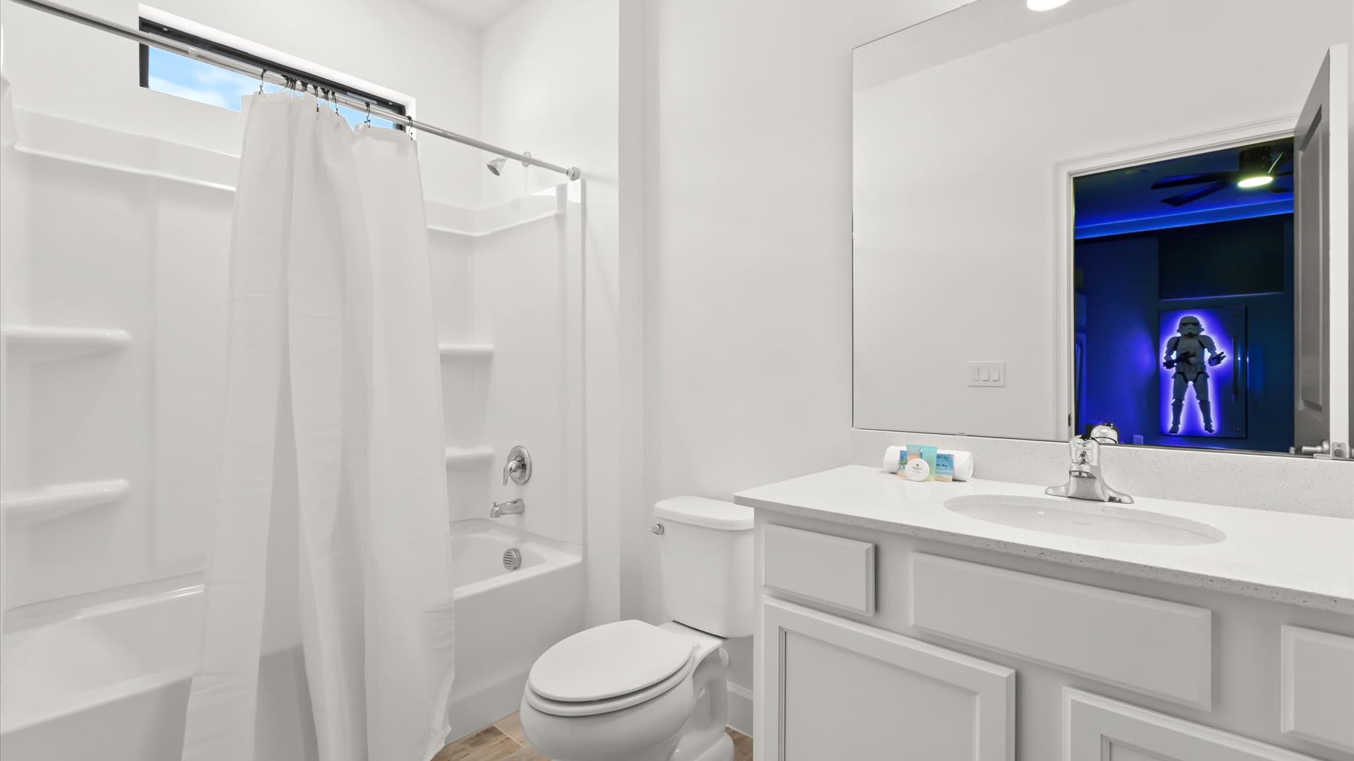Star Wars en-suite bathroom with combined bathtub and shower
