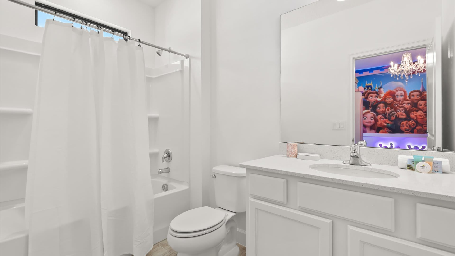 Princess themed bedroom en-suite bathroom with combined bathtub and shower