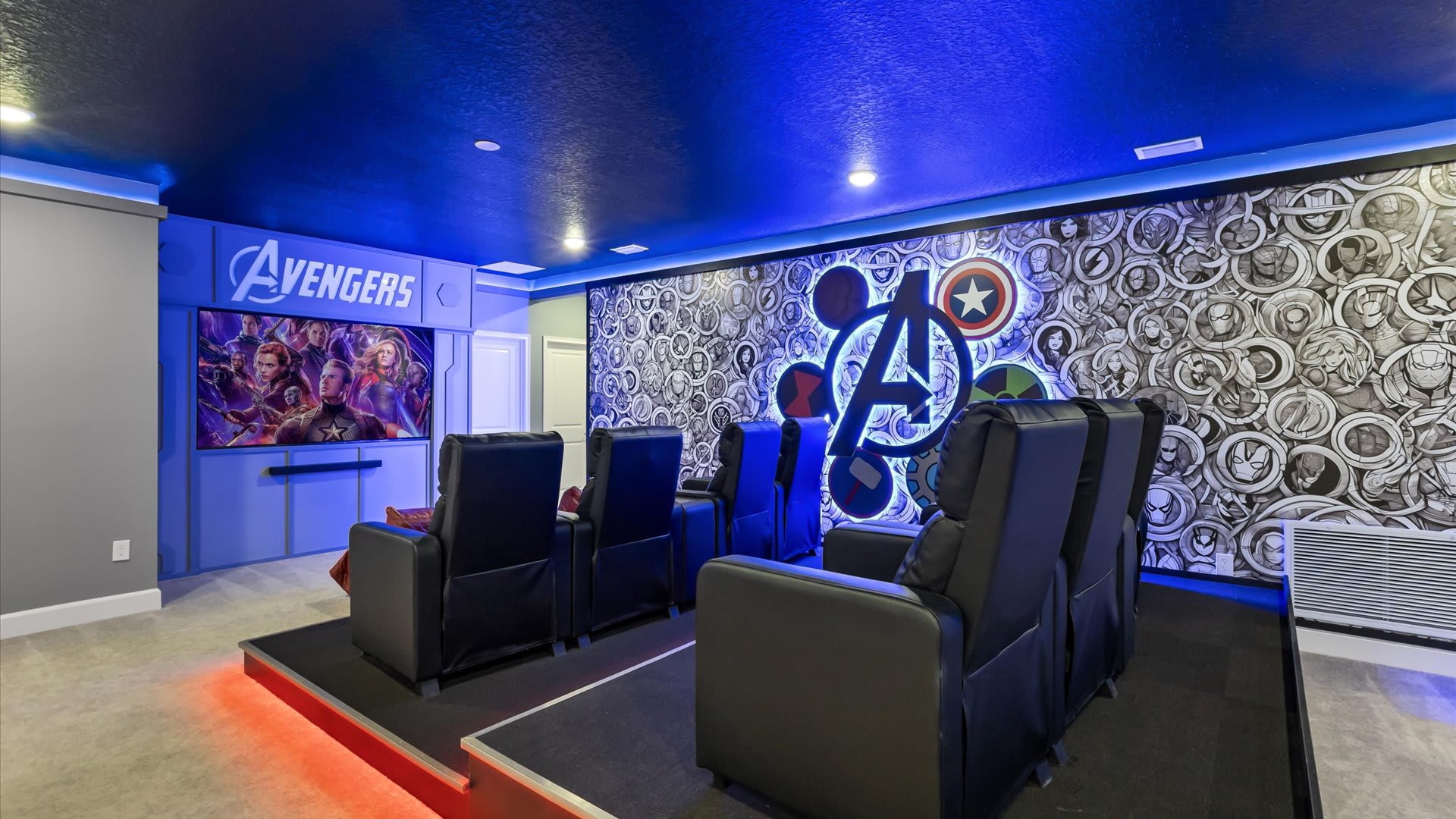 Avengers themed cinema room with recliner seats