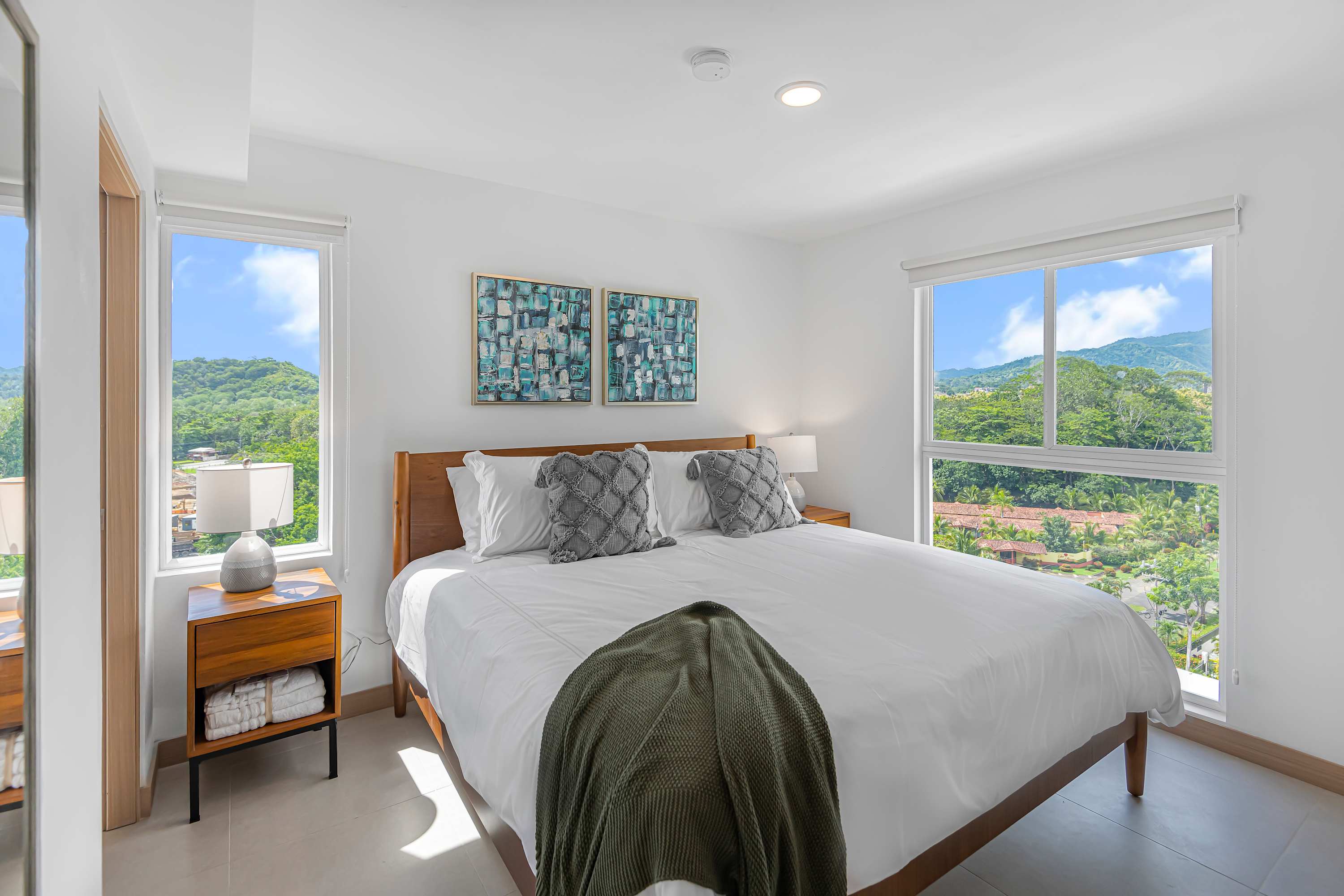 King Bedroom: Spacious and elegant, this bedroom features a luxurious king bed and soft lighting for a peaceful night’s rest.