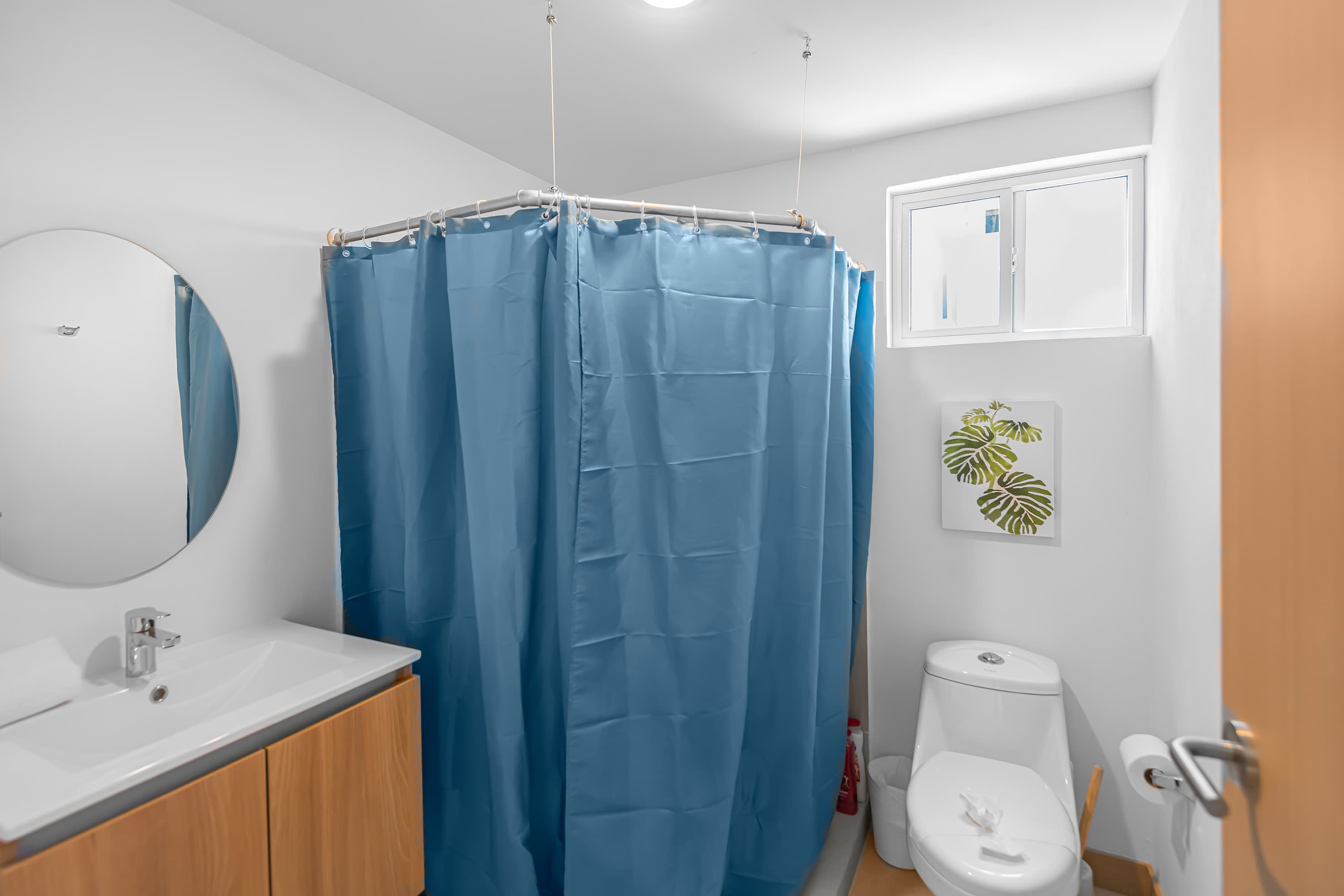 Shared Bathroom: Conveniently located and well-appointed, the shared bathroom features clean finishes and all the essentials you need during your stay.