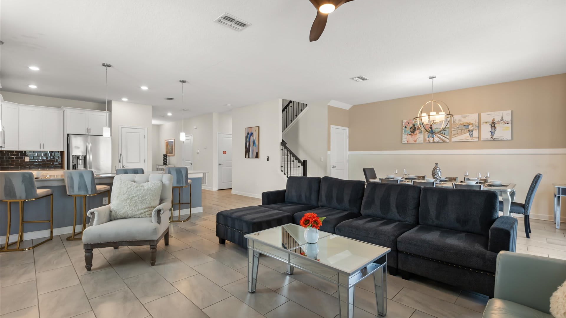 Downstairs Lounge Area: A welcoming space with ample seating, perfect for gathering with loved ones to relax, chat, or unwind after a day of adventures.