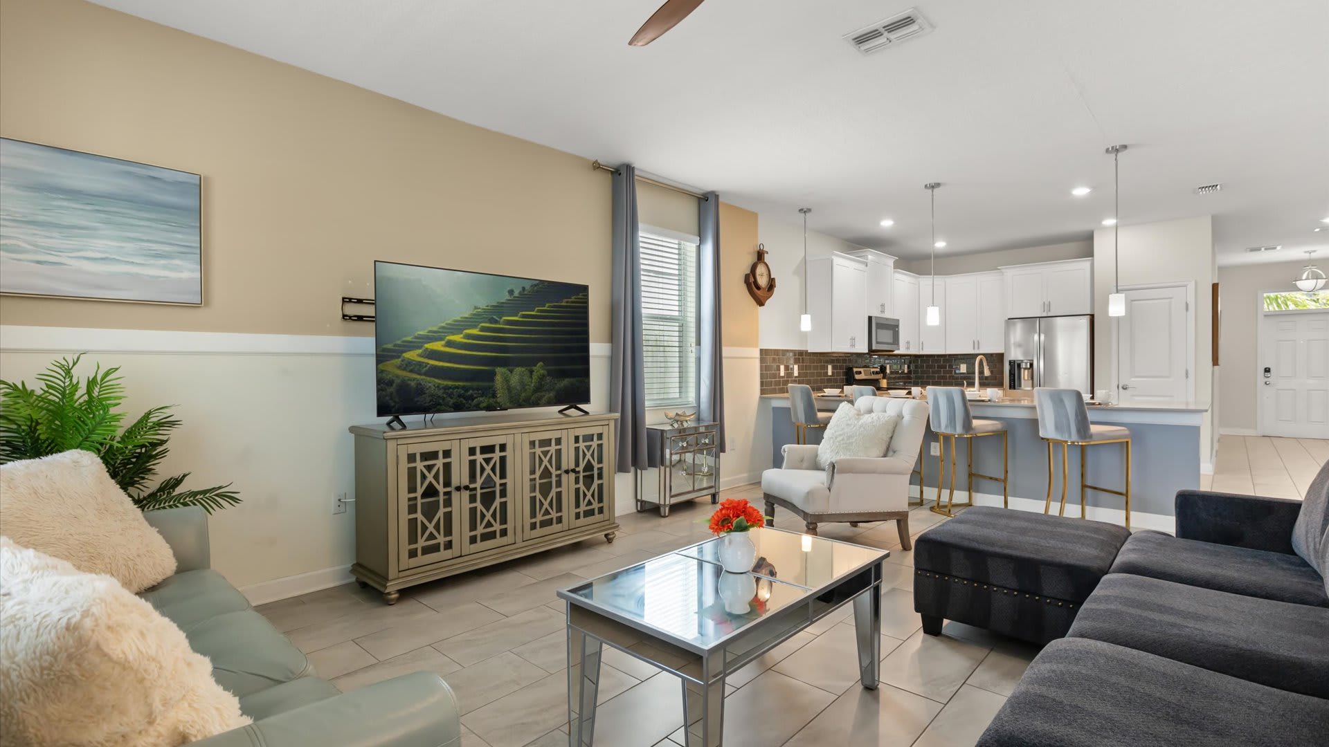 Downstairs Lounge Area: A welcoming space with ample seating, perfect for gathering with loved ones to relax, chat, or unwind after a day of adventures.