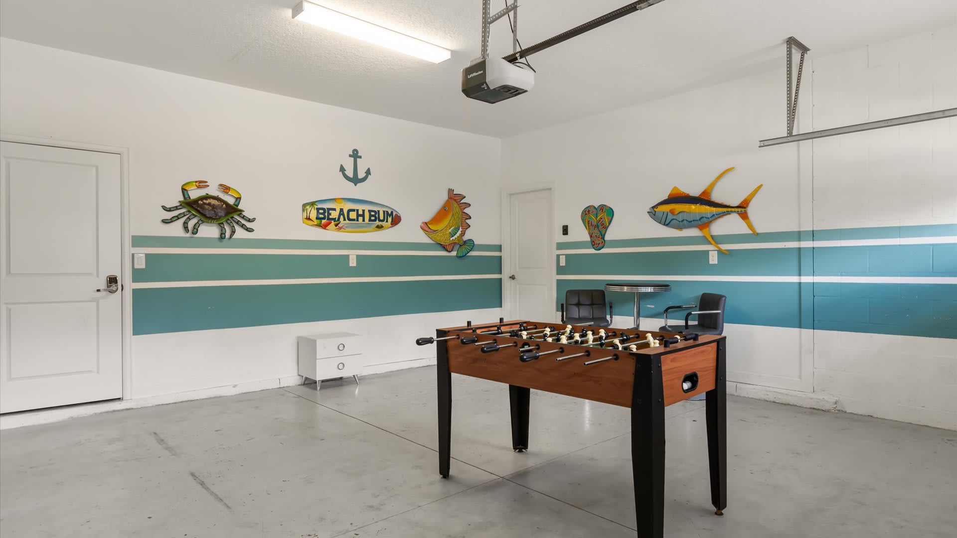 Garage Games Room: With a foosball table for friendly competition.