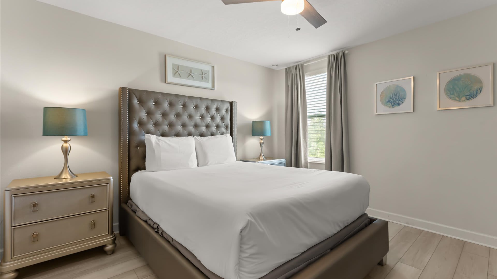 Second Floor, Queen Bed + Shared Bath: Bright and inviting, this queen room offers comfort and easy access to a shared bathroom.