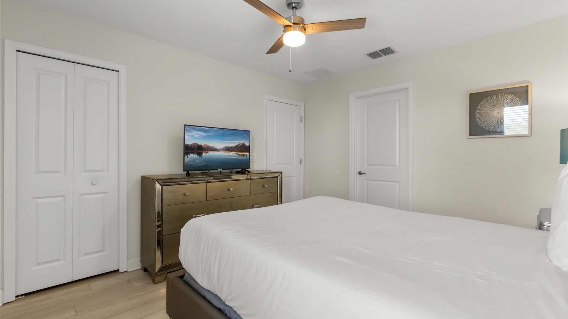 Second Floor, Queen Bed + Shared Bath: Bright and inviting, this queen room offers comfort and easy access to a shared bathroom.