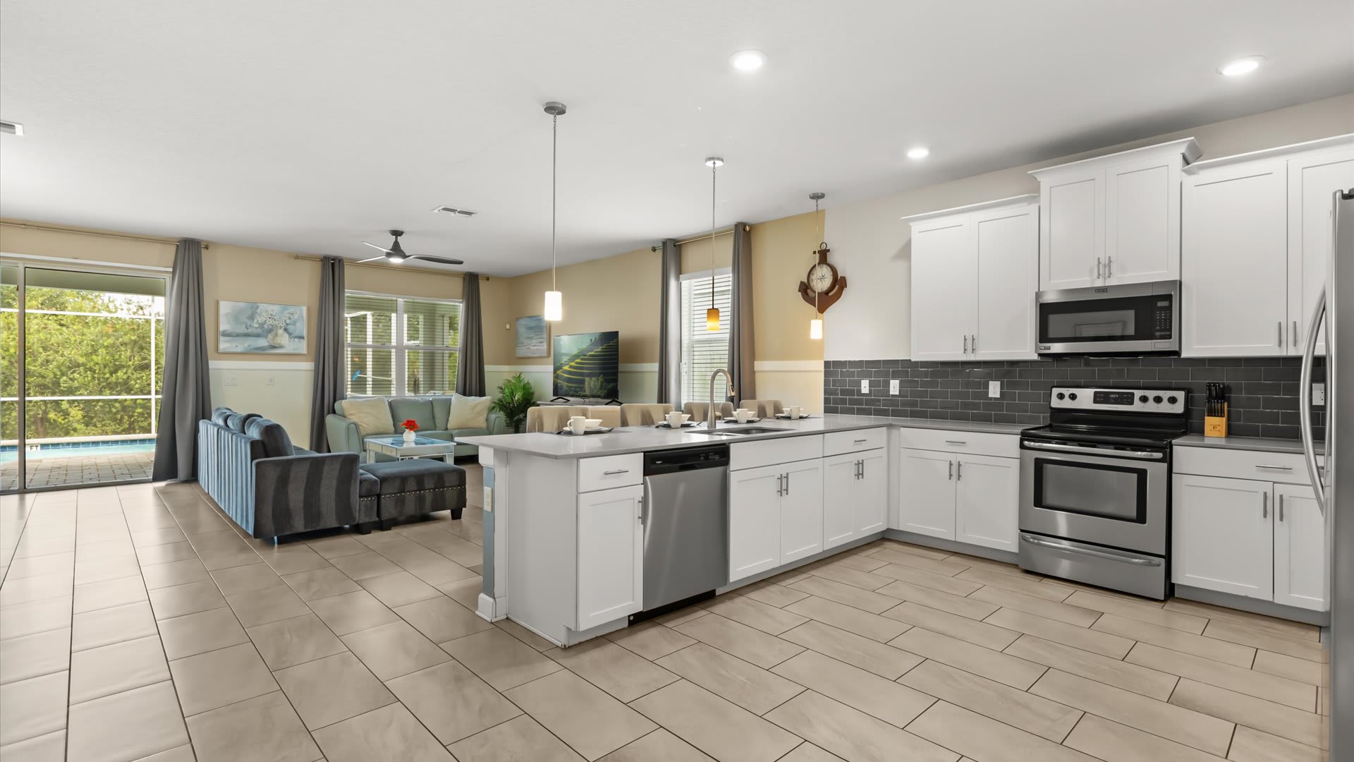 Kitchen: A bright window over the sink brings in natural light as you prepare meals. Complete with modern appliances, a dishwasher, and all essentials, the space is designed for both function and comfort.