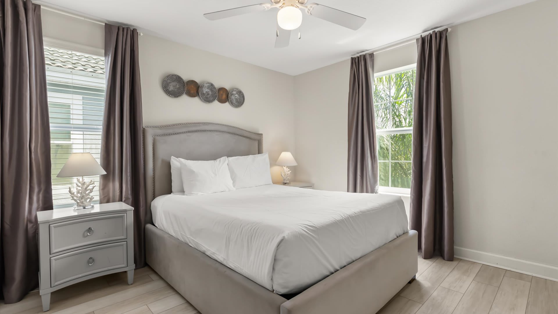 Second Floor, Queen Bed + Shared Bath: A cosy queen bedroom designed for restful nights, conveniently located near a shared bath.