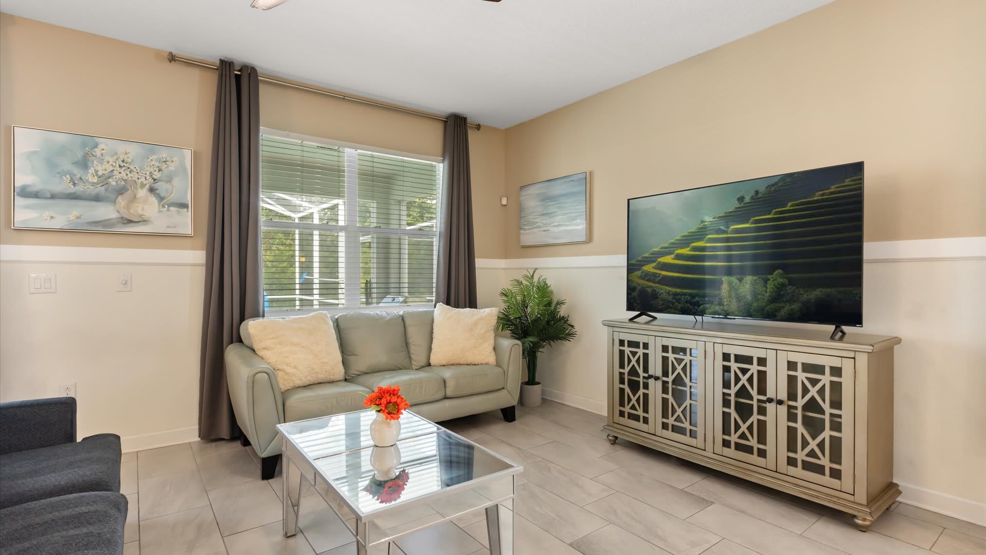 Downstairs Lounge Area: A welcoming space with ample seating, perfect for gathering with loved ones to relax, chat, or unwind after a day of adventures.