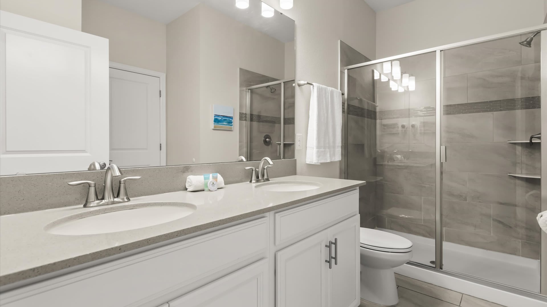 First Floor King Bedroom 2 En-suite: with a double basin, and a spacious standing shower