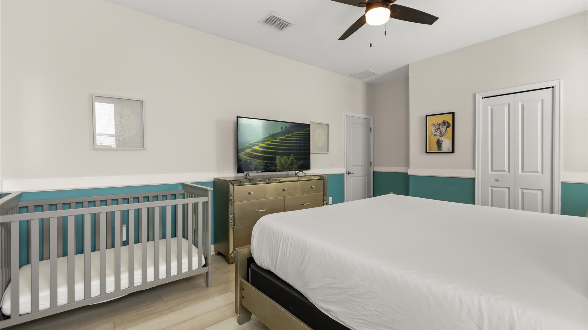 First Floor, King Bed + Ensuite + Crib: A spacious retreat with a plush king bed and a private ensuite bath. The added crib makes it a perfect choice for families with little ones.