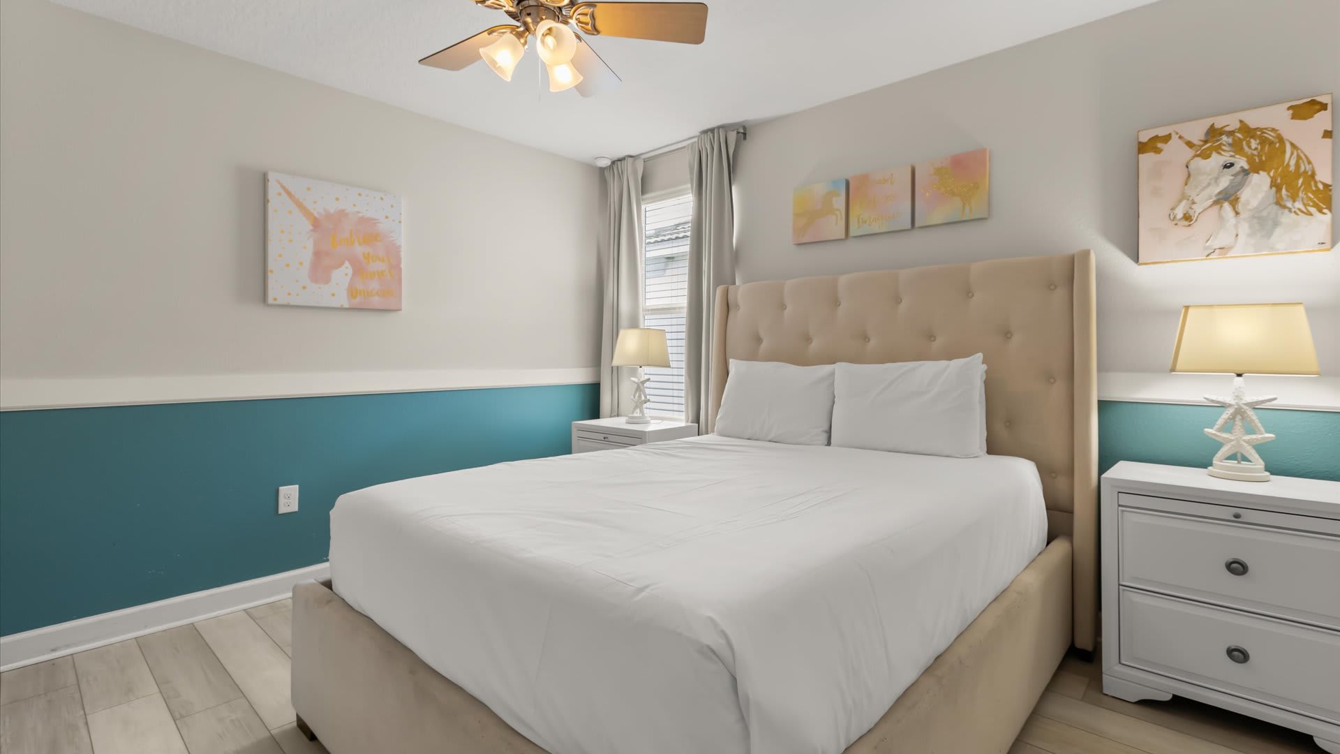 Second Floor, Queen Bed + Shared Bath: Another comfortable queen option with calming décor and shared bath access for convenience.