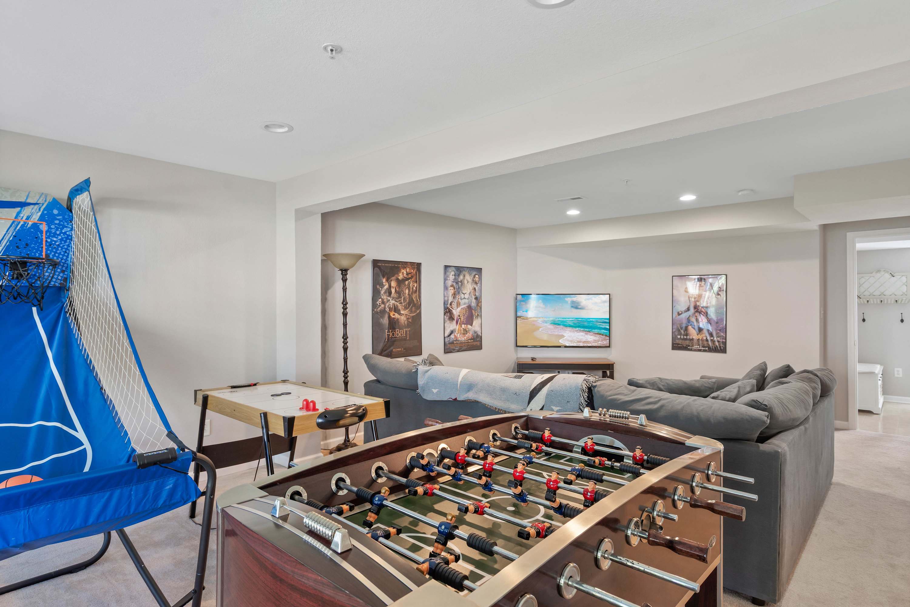 The lower-level game room is ideal for movie nights & game tournaments!​