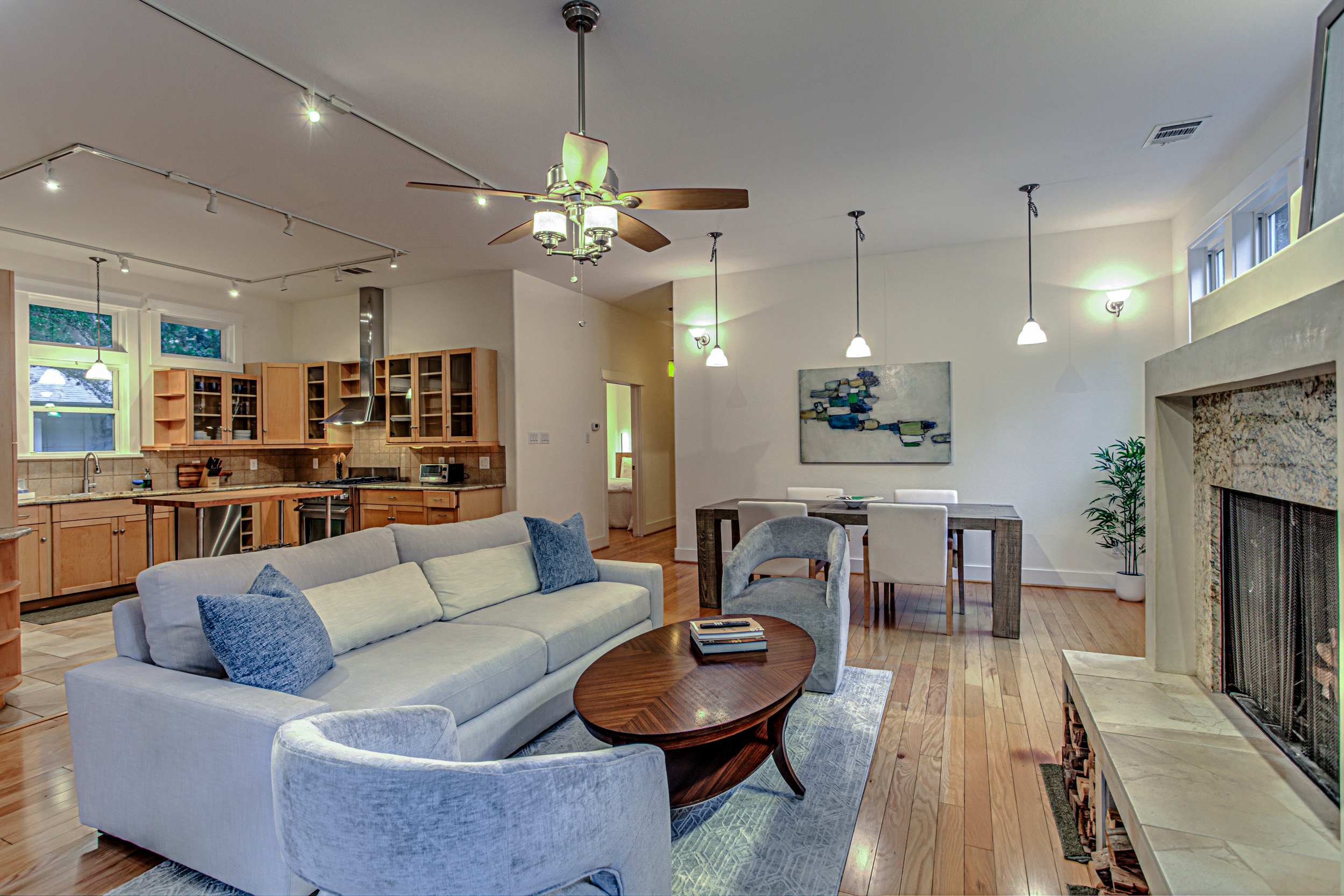 Cozy living room with a modern fireplace | Unit A