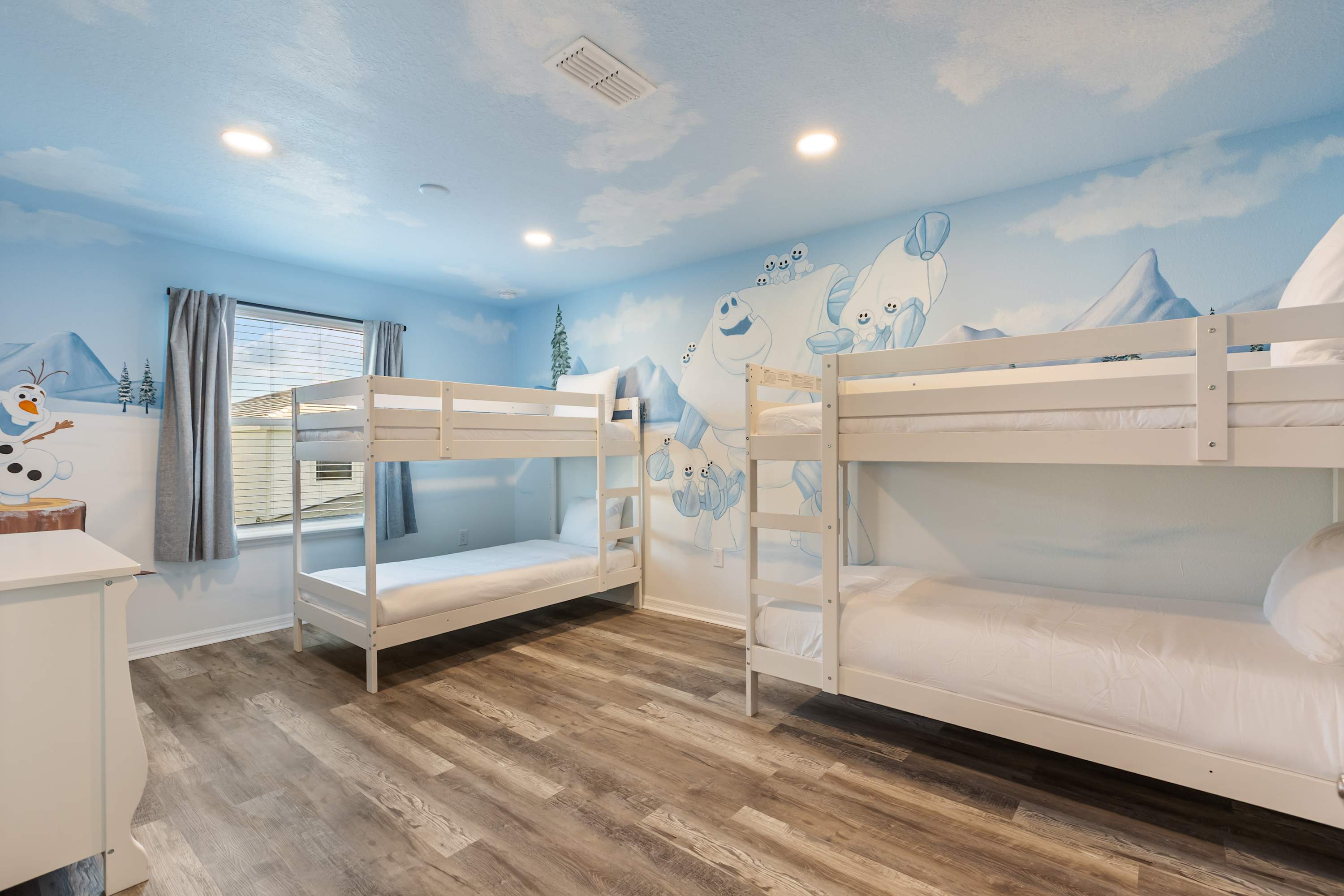 Bedroom 5 – Fun-filled frozen themed bunk room with two twin bunk beds— perfect for kids or groups.